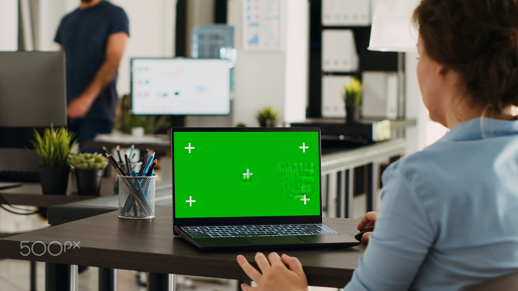 Manager working at office desk