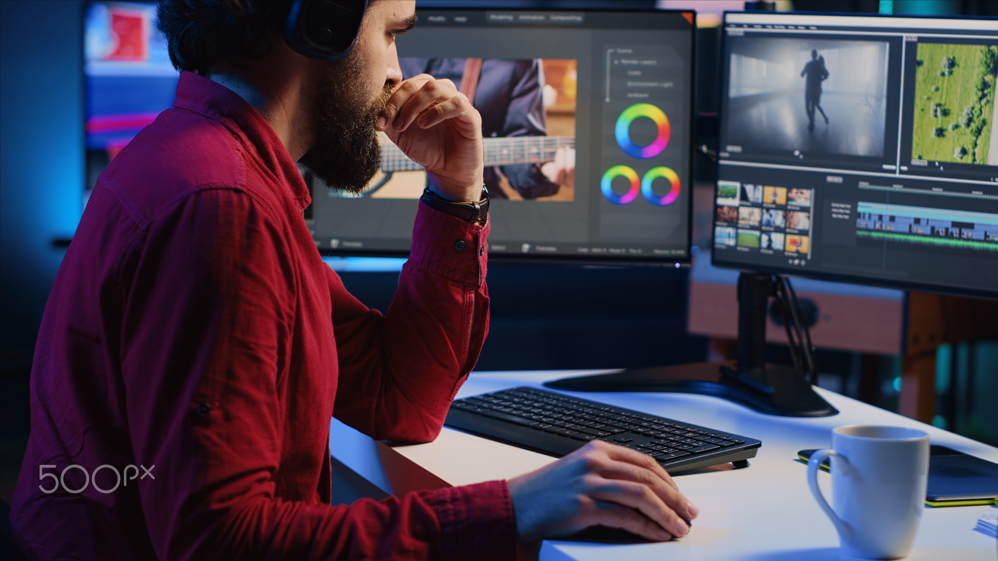 Videographer operating computer editing systems and equipment