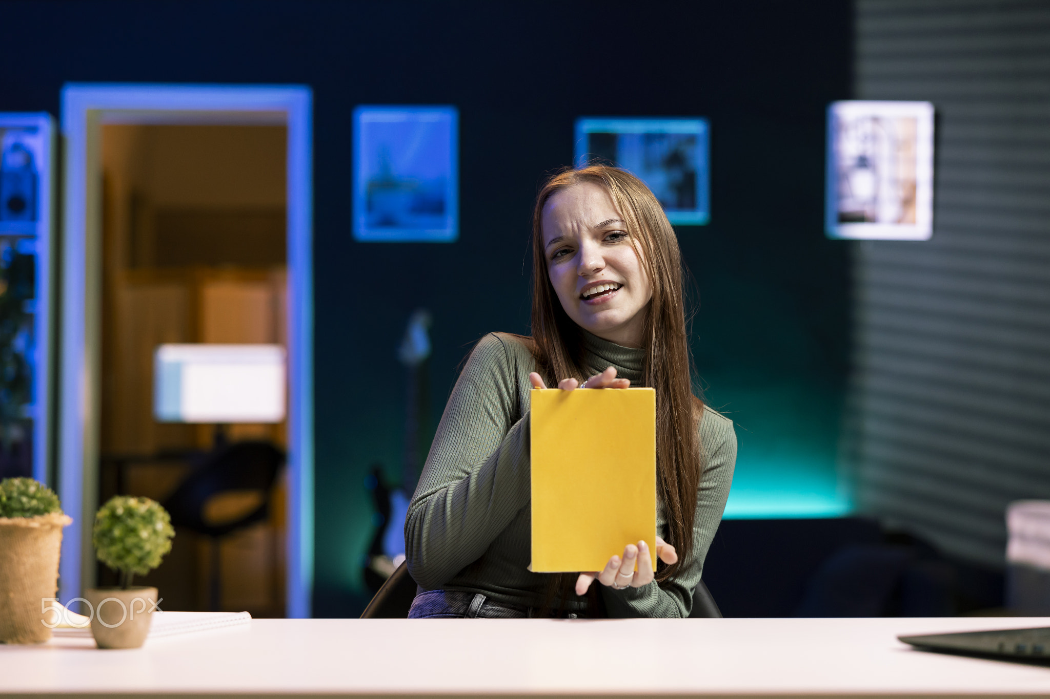 Young media star commenting on new book release, doing video essay