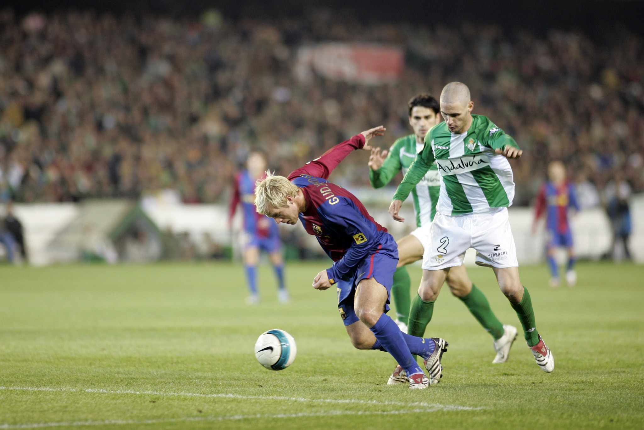 Gudjhonsen with the ball. Taken at Ruiz de Lopera stadium (Seville, Spain), during the Spanish Liga