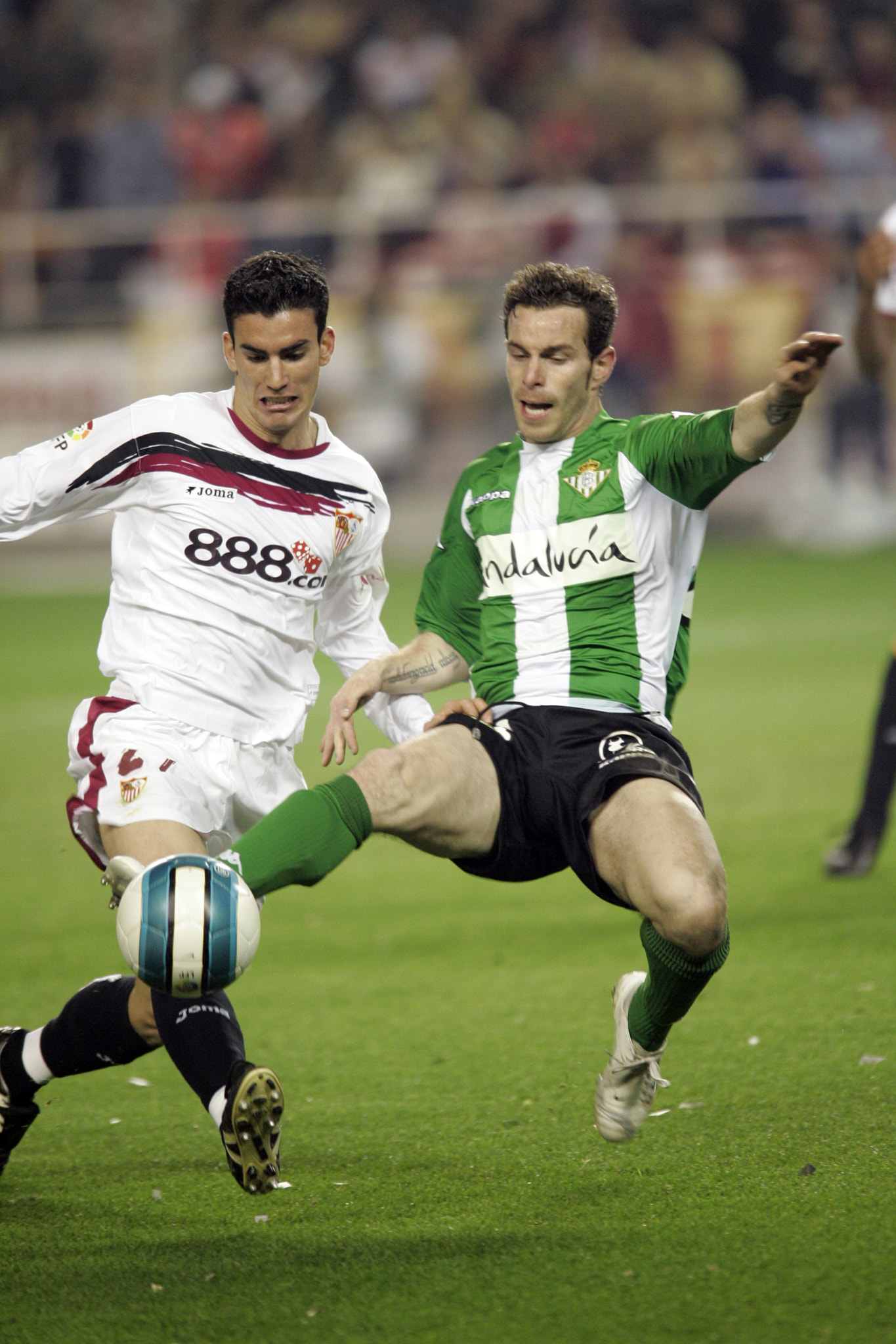 Fernando Vega (Betis) and Alejandro Alfaro (Sevilla) fighting for the ball. Taken at Sanchez Pizjuan