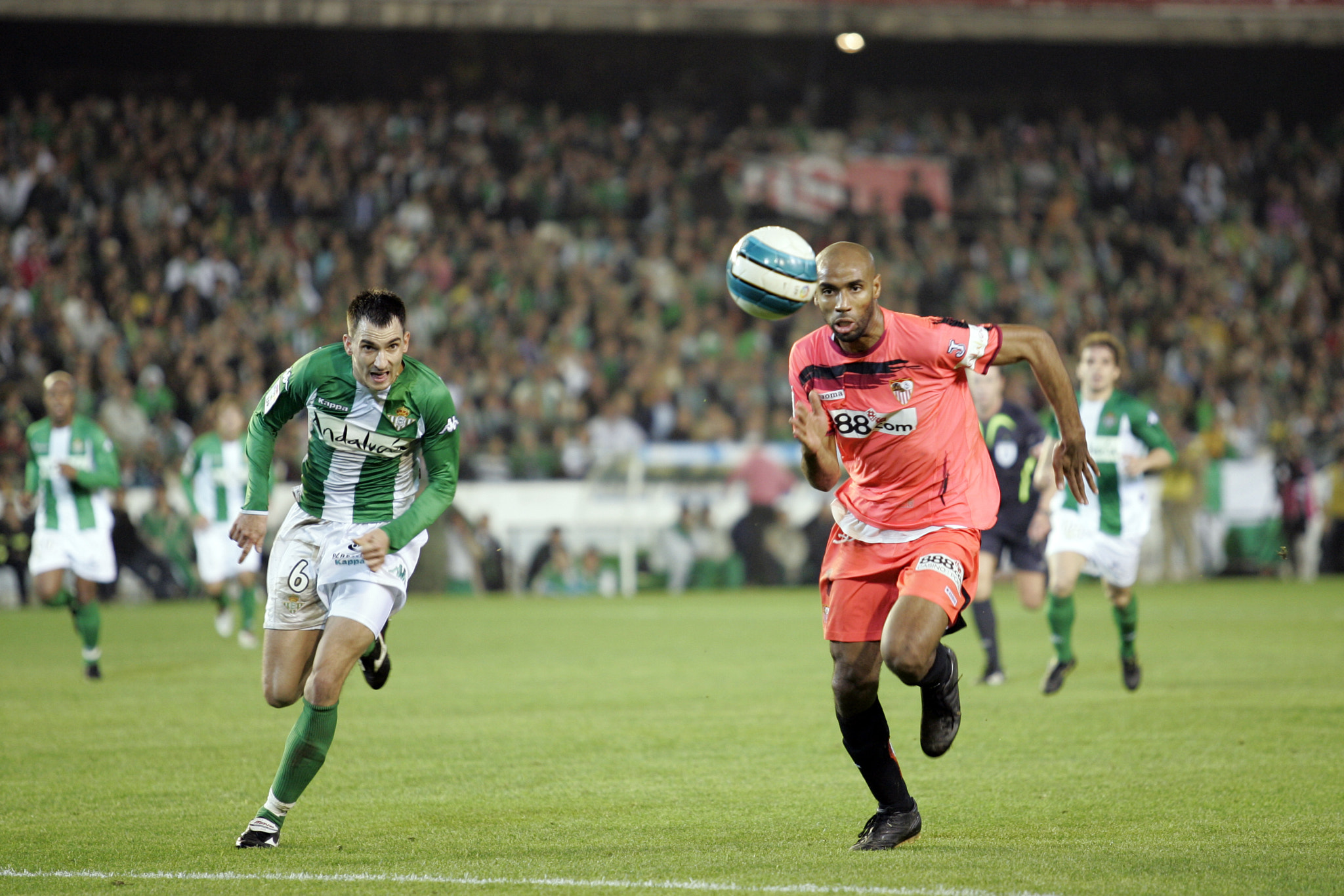 Kanoute and Ilic pursuing the ball. Local derby of the Spanish Liga between Real Betis Balompie and