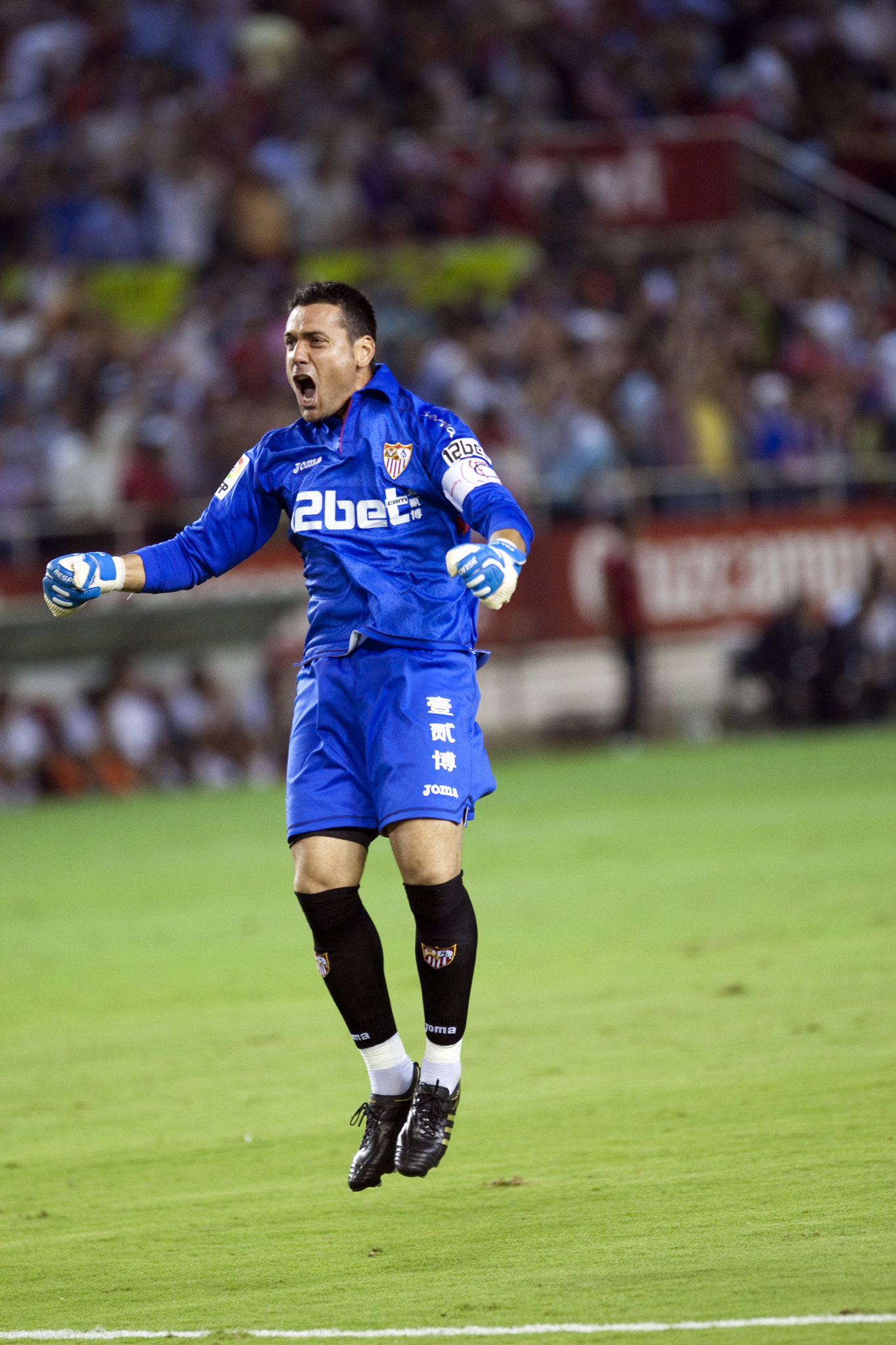 Sevilla FC goalkeeper, Andres Palop, celebrates a goal. Spanish League game between Sevilla FC and R