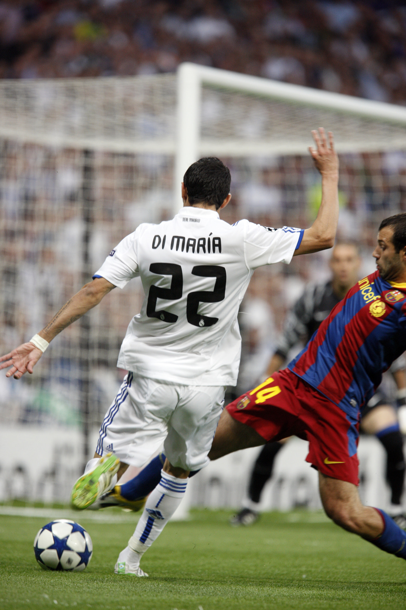 Di Maria about to center, UEFA Champions League Semifinals game between Real Madrid and FC Barcelona
