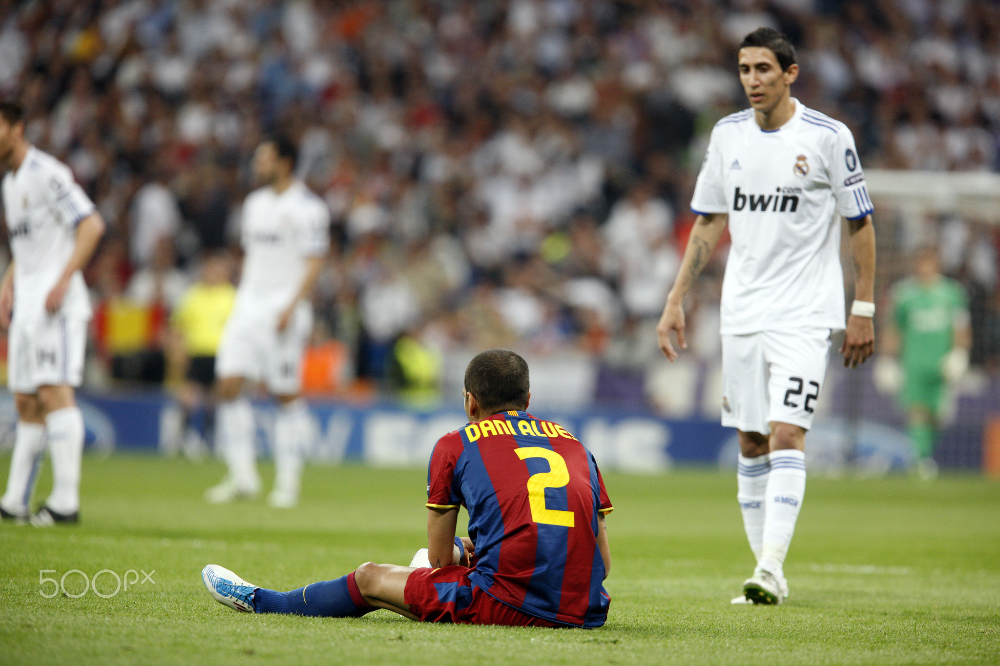 Alves sitting on the ground, UEFA Champions League Semifinals game between Real Madrid and FC Barcel