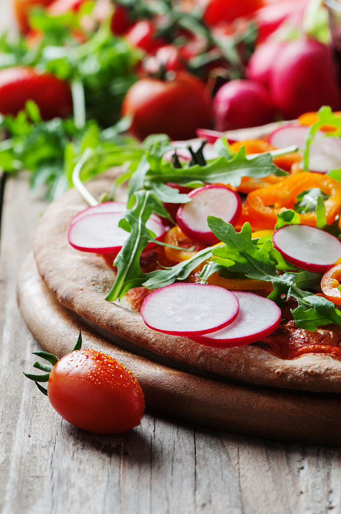 Vegan pizza with radish, tomato and paprika by Oxana Denezhkina on 500px.com