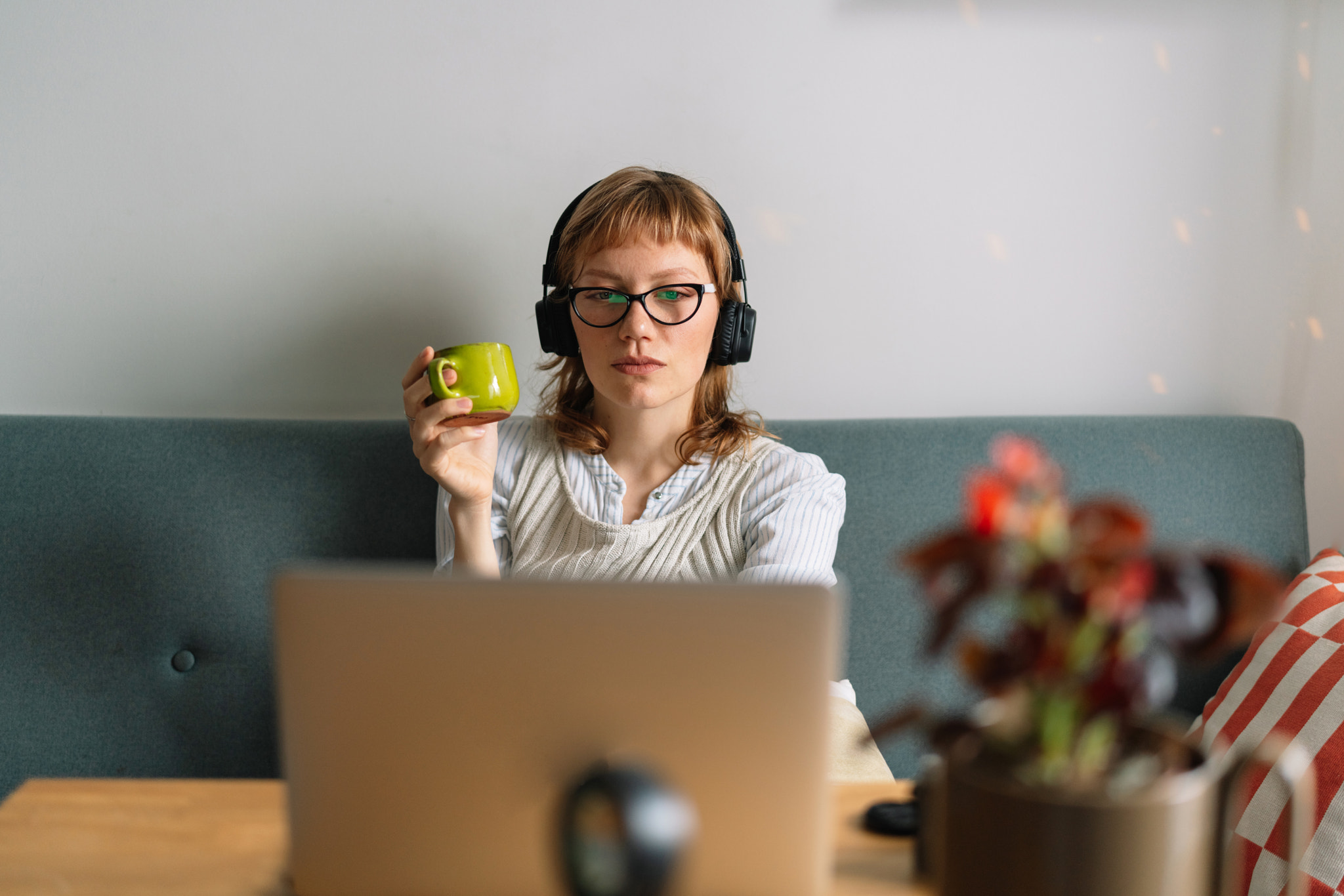 Young woman working late at home