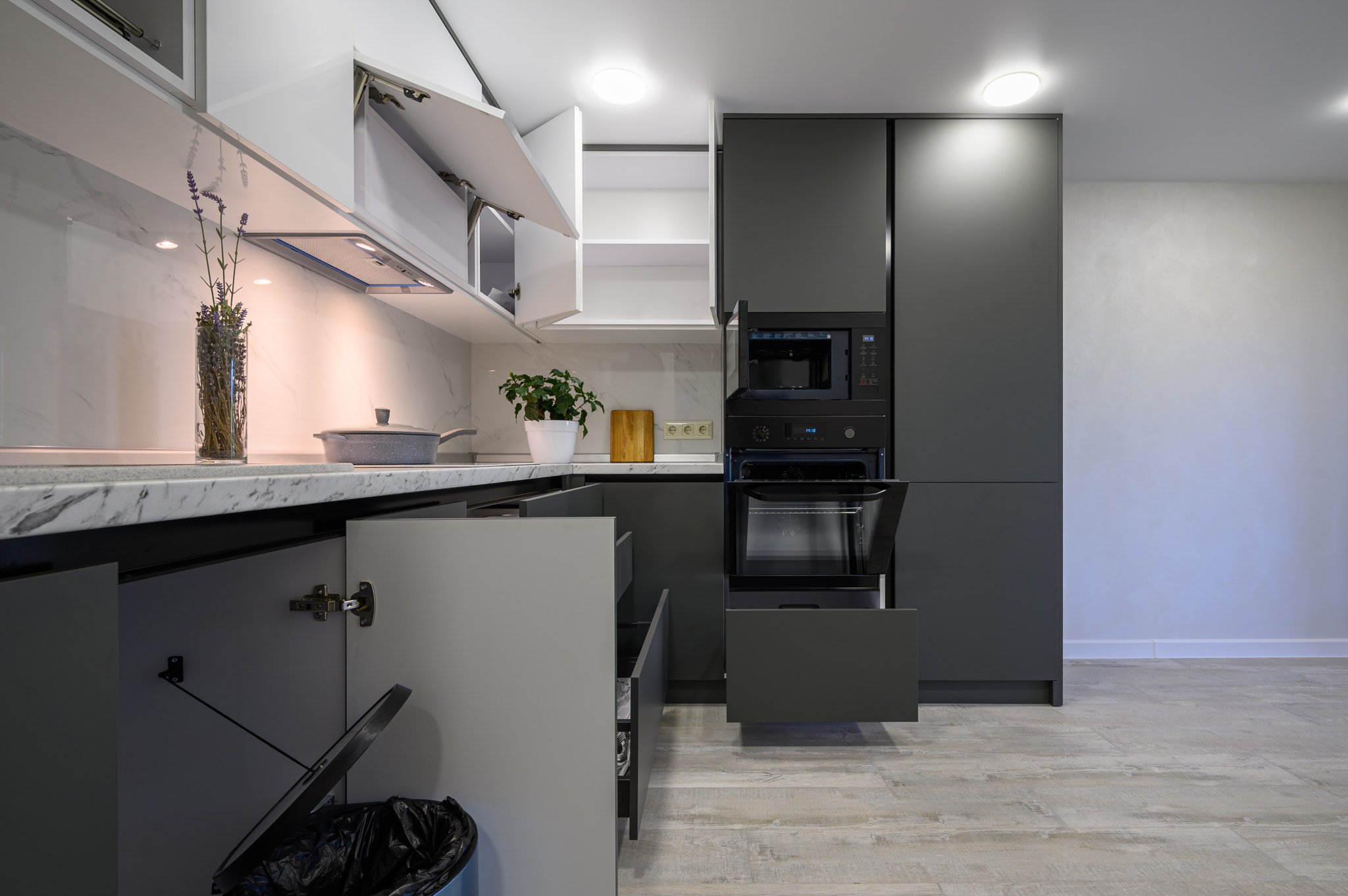 Modern simple trendy dark grey and white kitchen