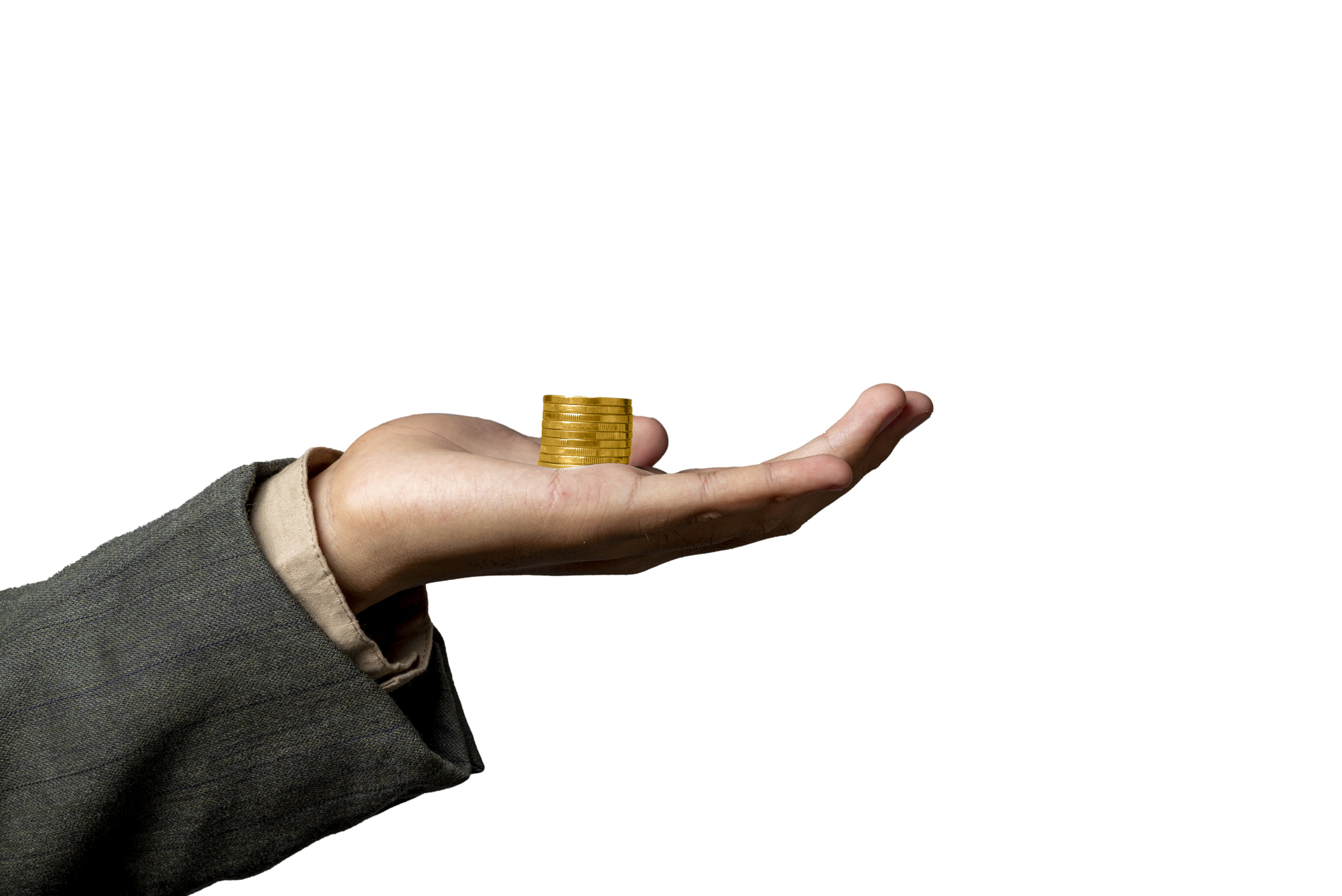 A businessman shows a stack of golden coins