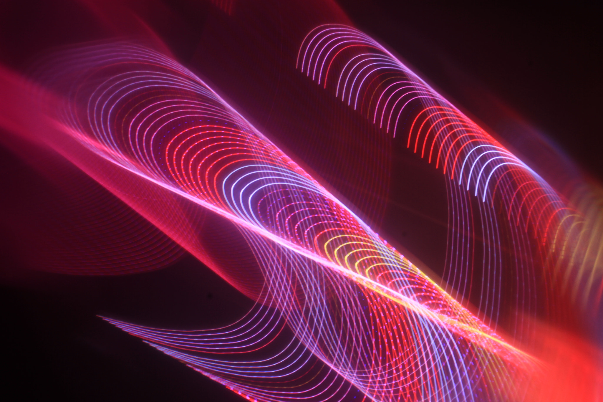 Close-up of light trails against black background