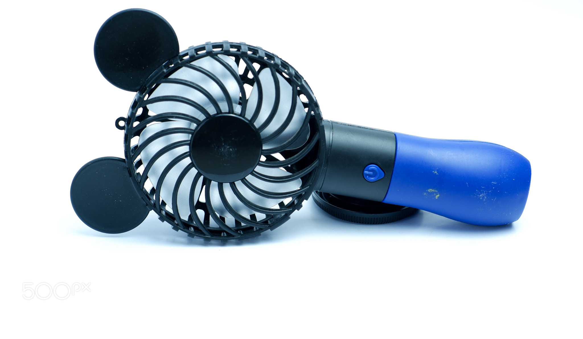 A Mini Fan Toy On A White Background Isolated
