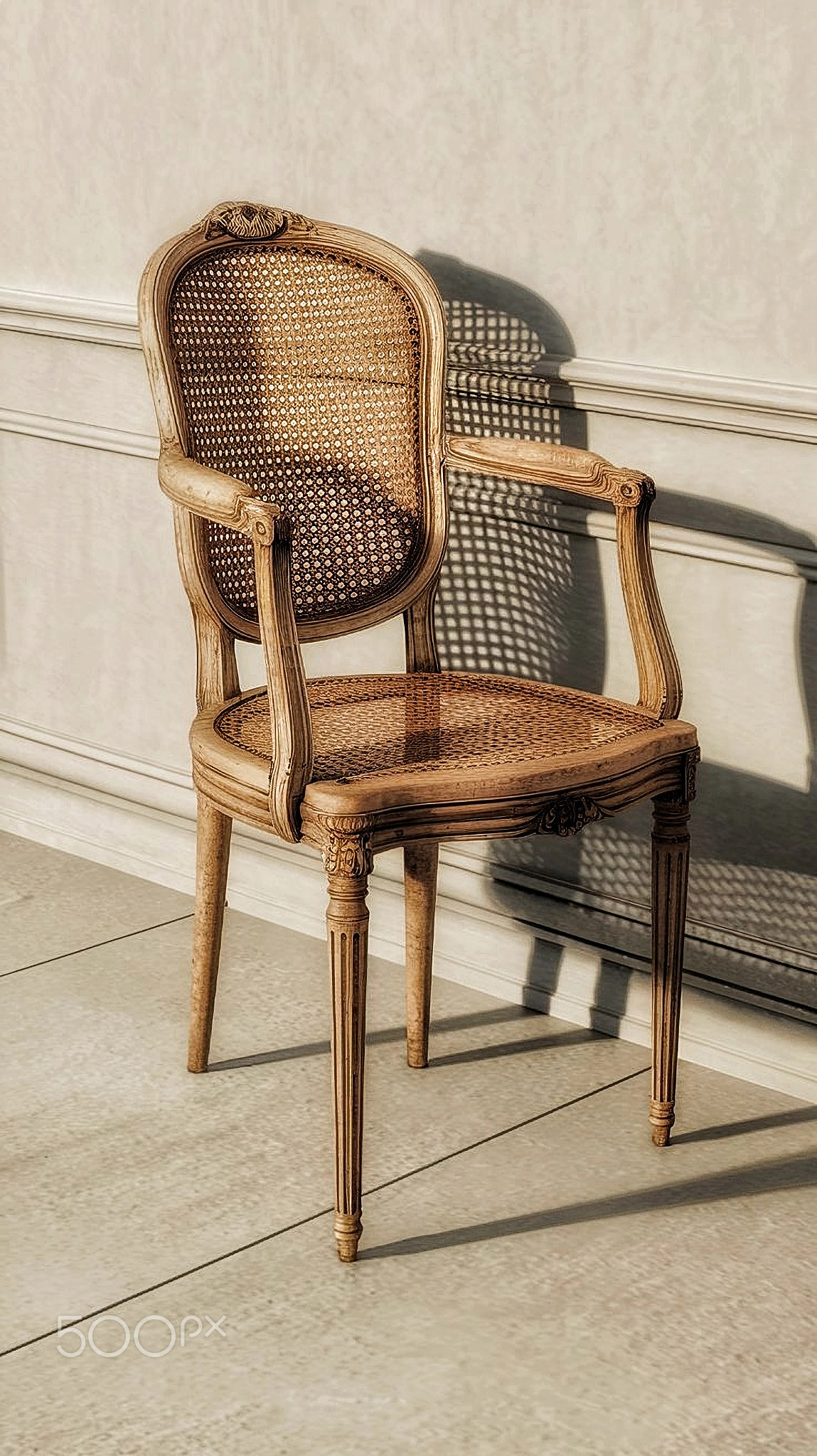 Luxury beige vintage style armchair sofa in a vintage room