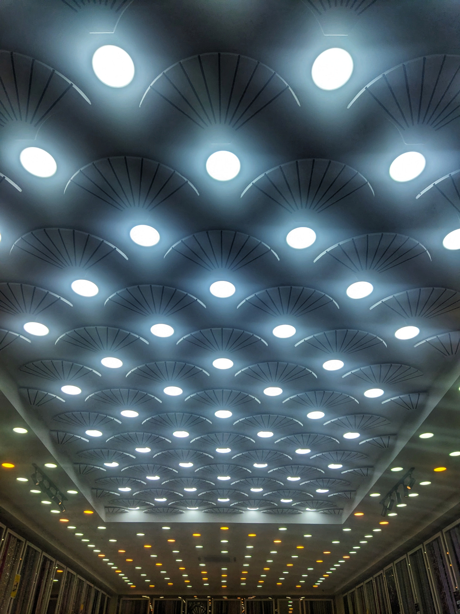 Low angle view of illuminated ceiling
