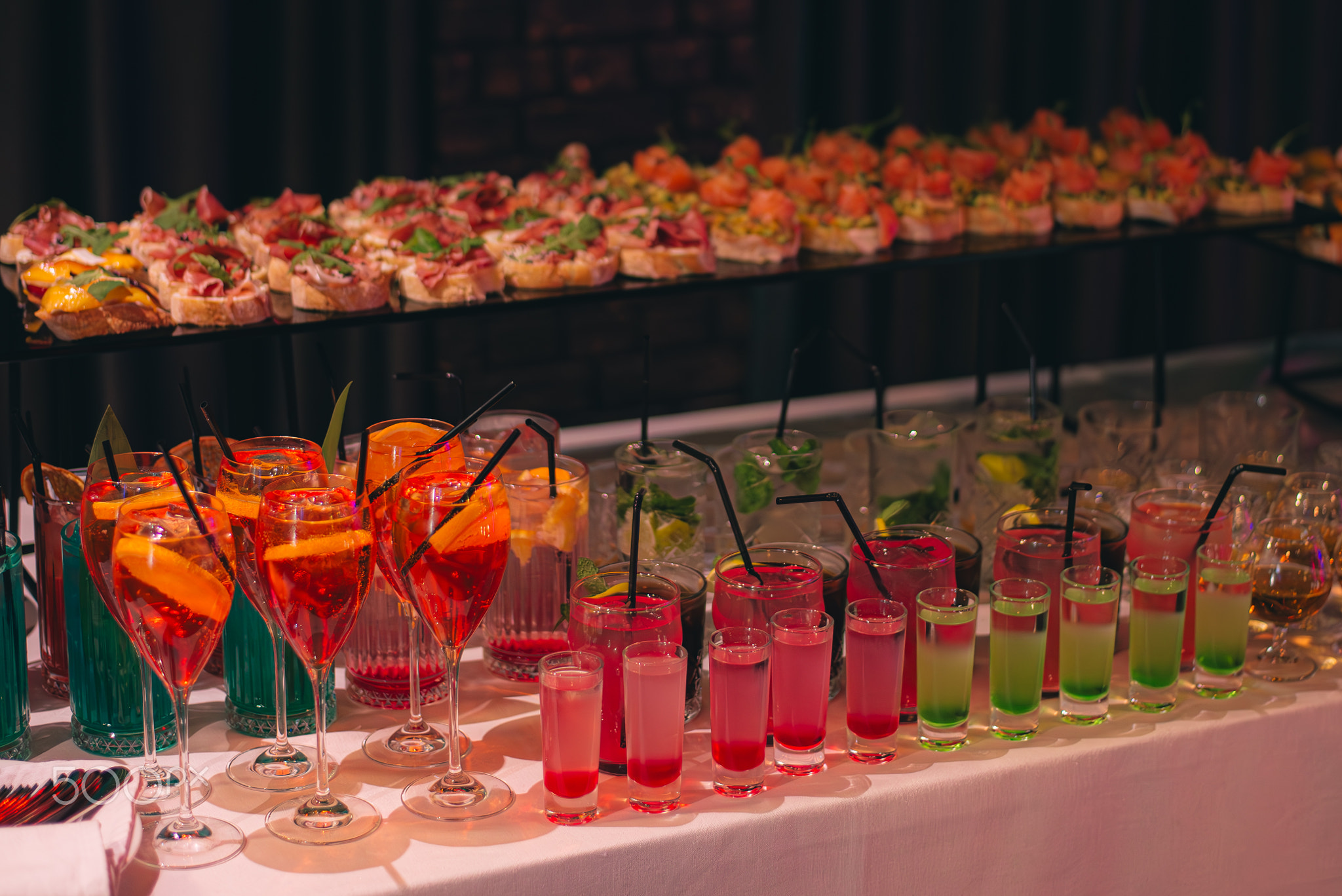 Cocktails set on a bar at Casino. Cocktails assortment.