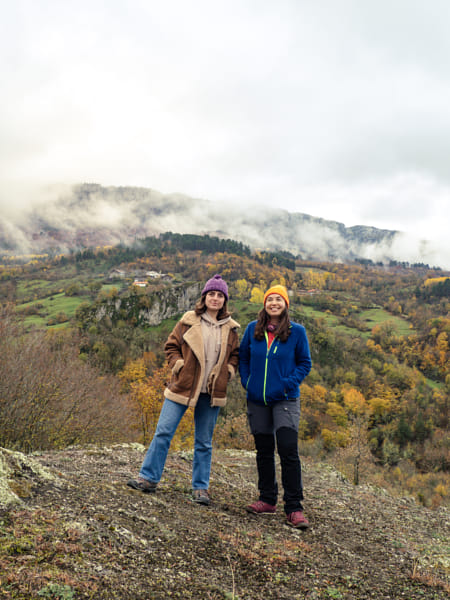 Two women standing on mountain against sky by NECMETT?N SOBUTAY on 500px.com