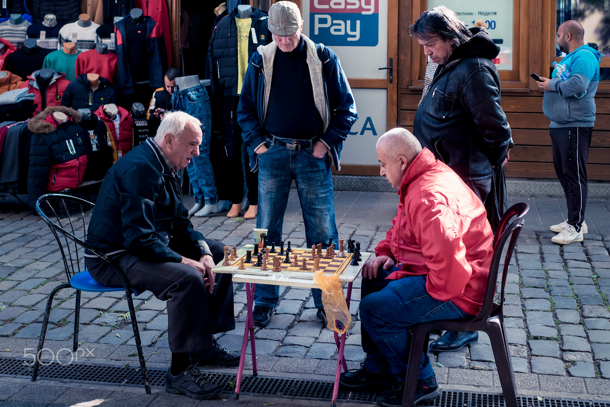 Chess Game at the Marketplace