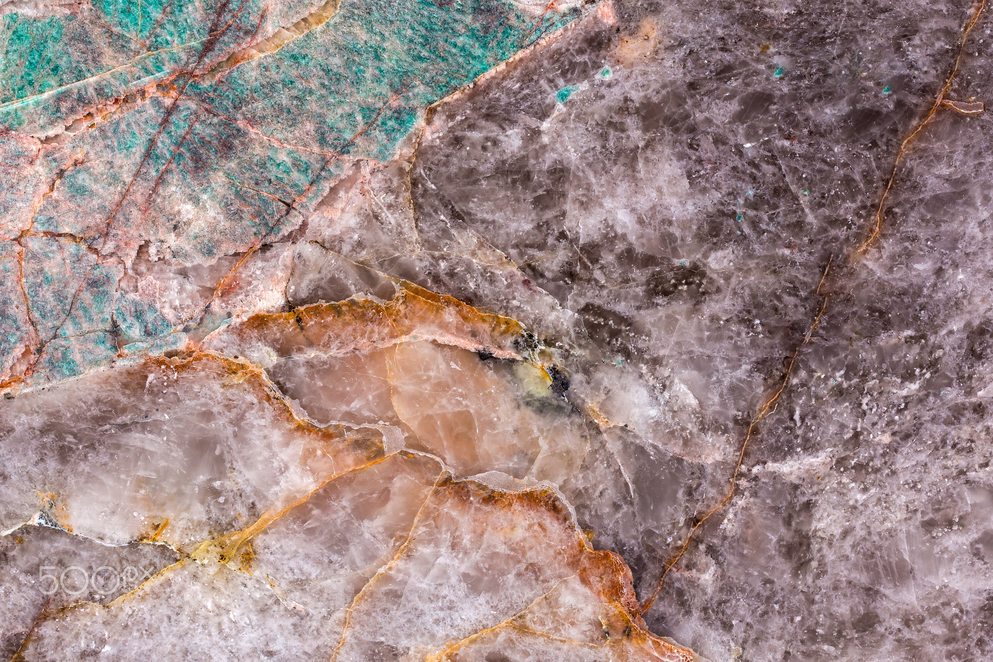 Close-up of high-quality natural quartzite texture with intricate patterns and color variations.