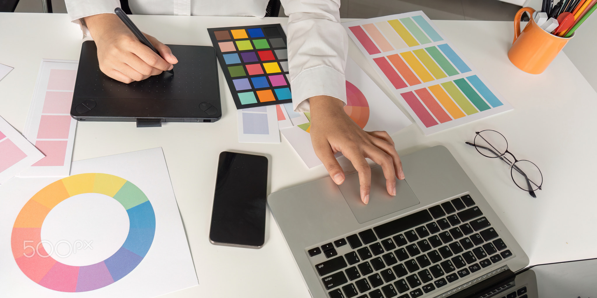 Creative design process in graphic design workspace office environment