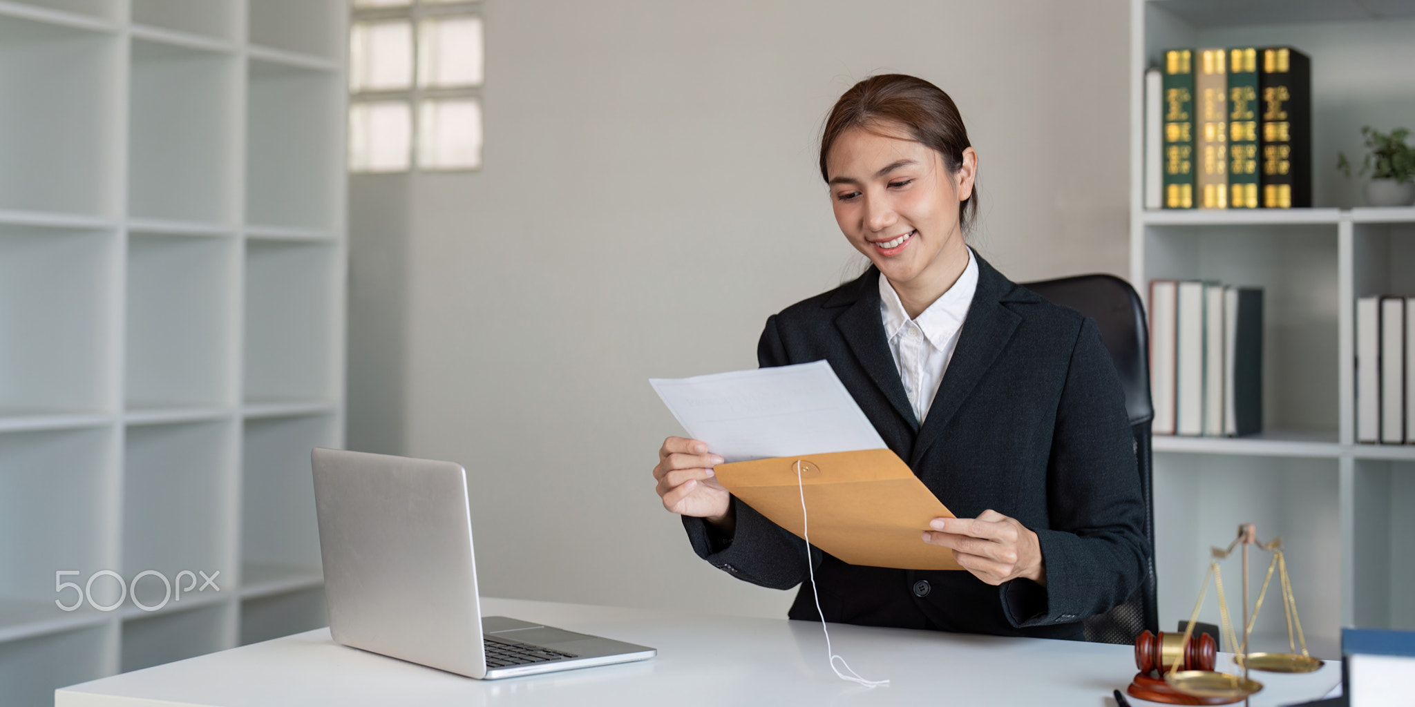 Lawyer reviewing important case documents modern office professional