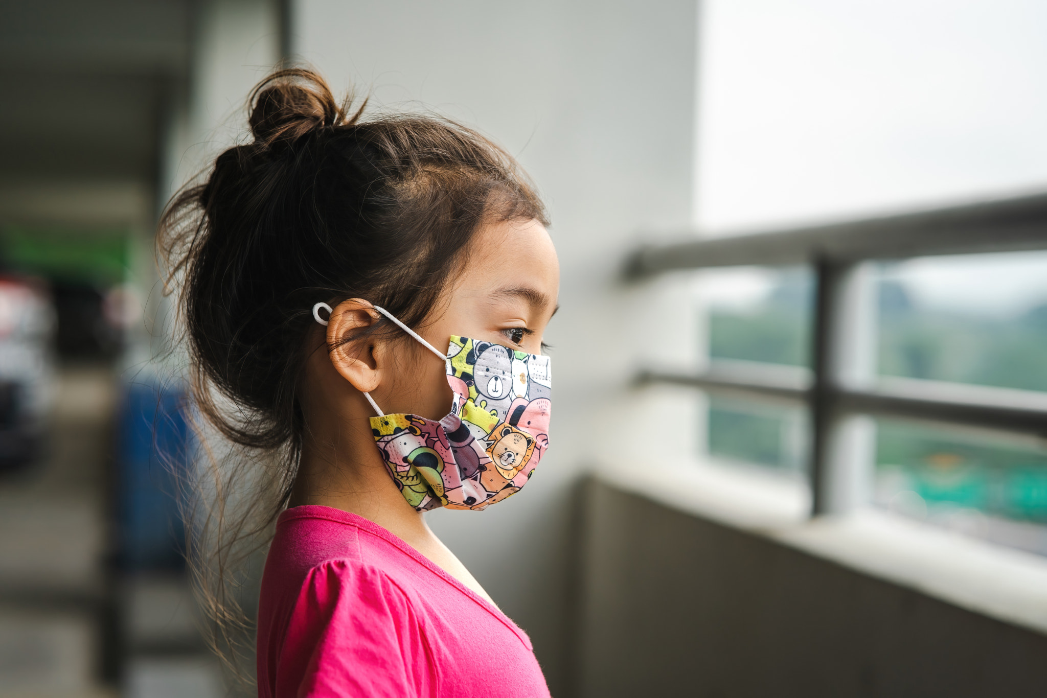 Coronavirus Covid-19 pm2.5. Little asian girl wearing face mask in outdoor. Covid-19 coronavirus. St