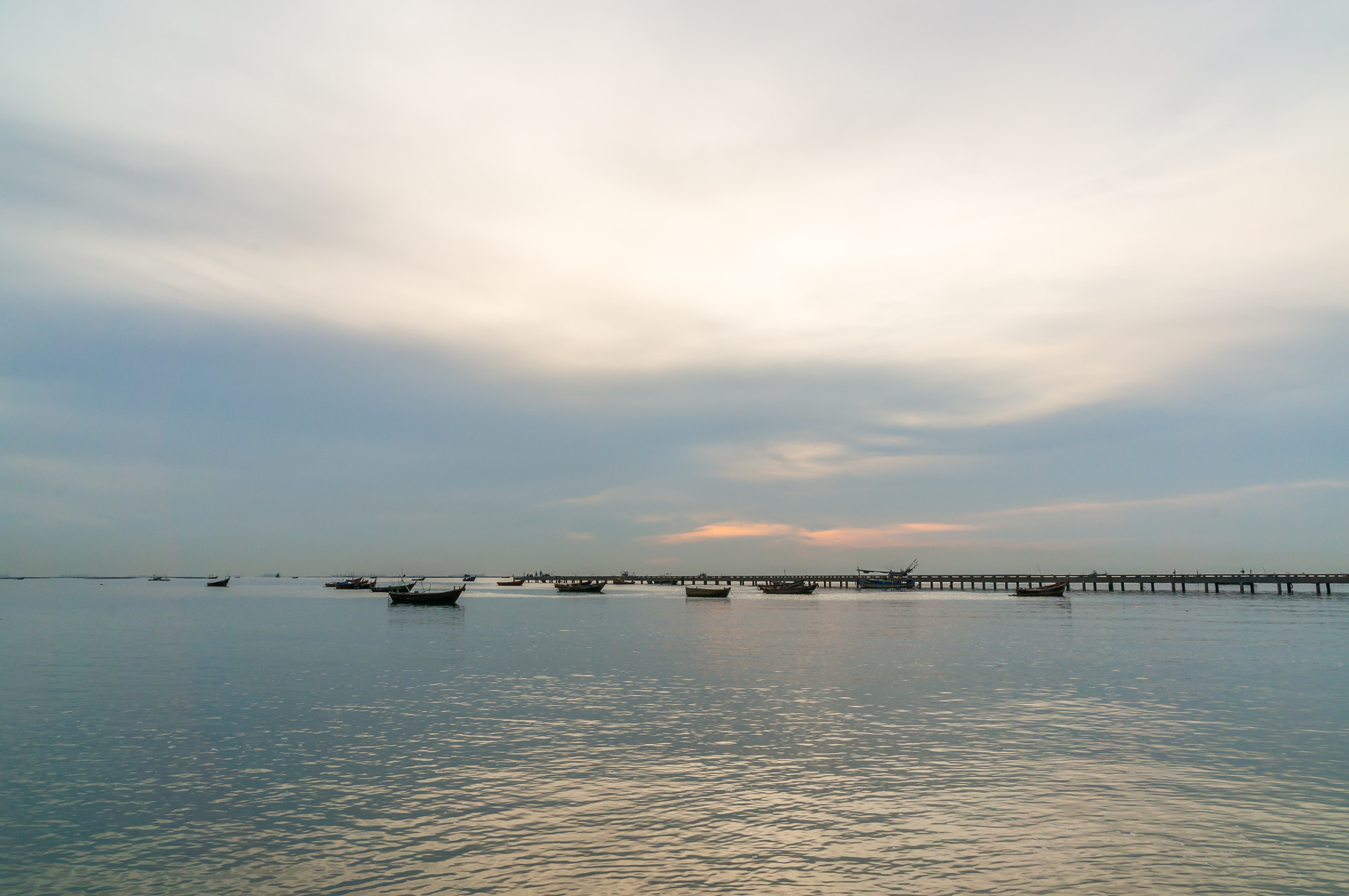 Sony Alpha NEX-6 + Sony Vario-Tessar T* E 16-70mm F4 ZA OSS sample photo. Sunset and fishing boat photography