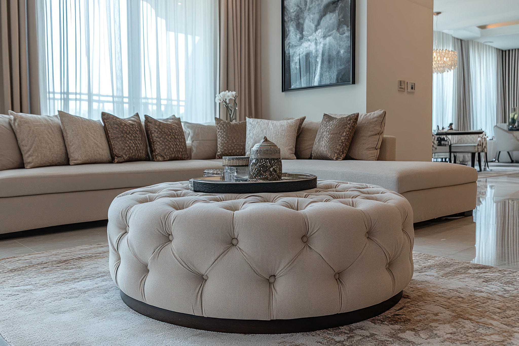Elegant living room with plush seating and decor.