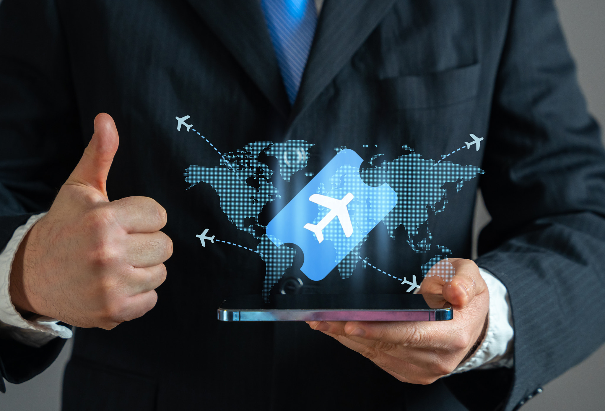 Businessman booking air tickets. Flight booking purchase services. Business trips. Flight schedules 