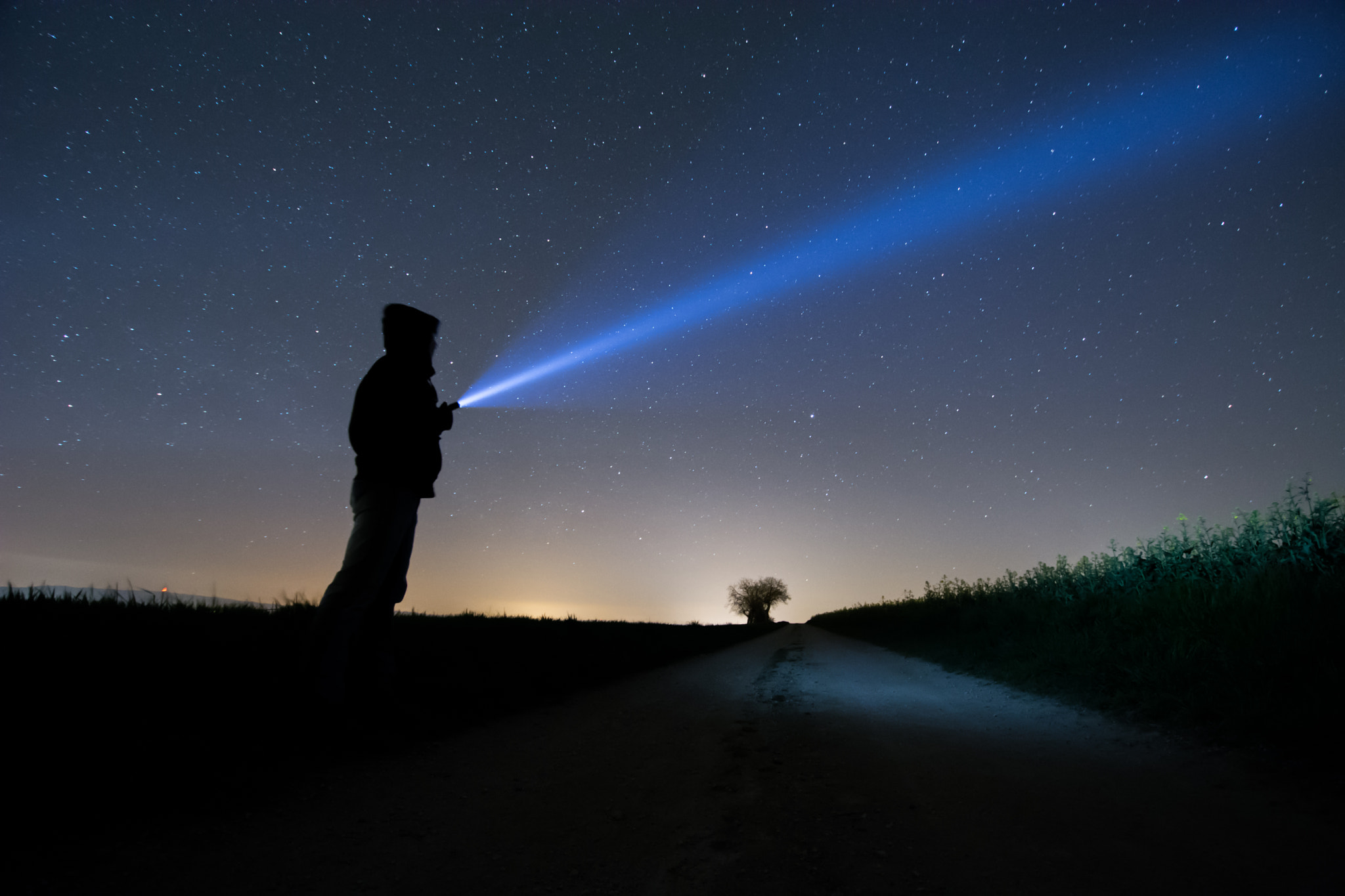 Man with the torch by Carim Jost / 500px