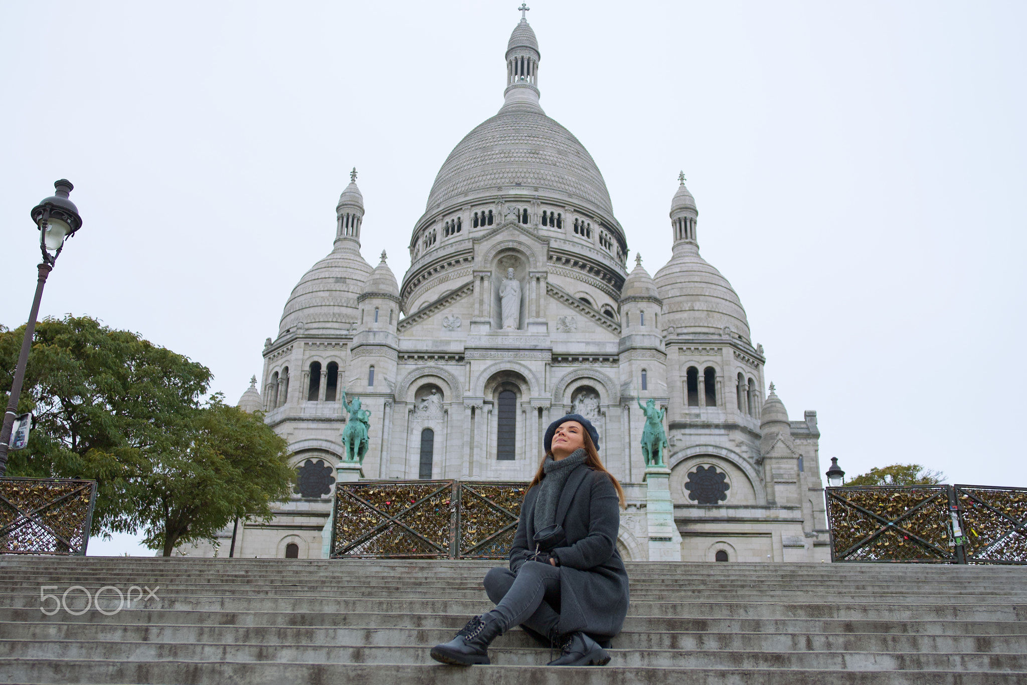 Beautiful Girl Exploring Sacre Coeur in Montmartre on a Winter Day