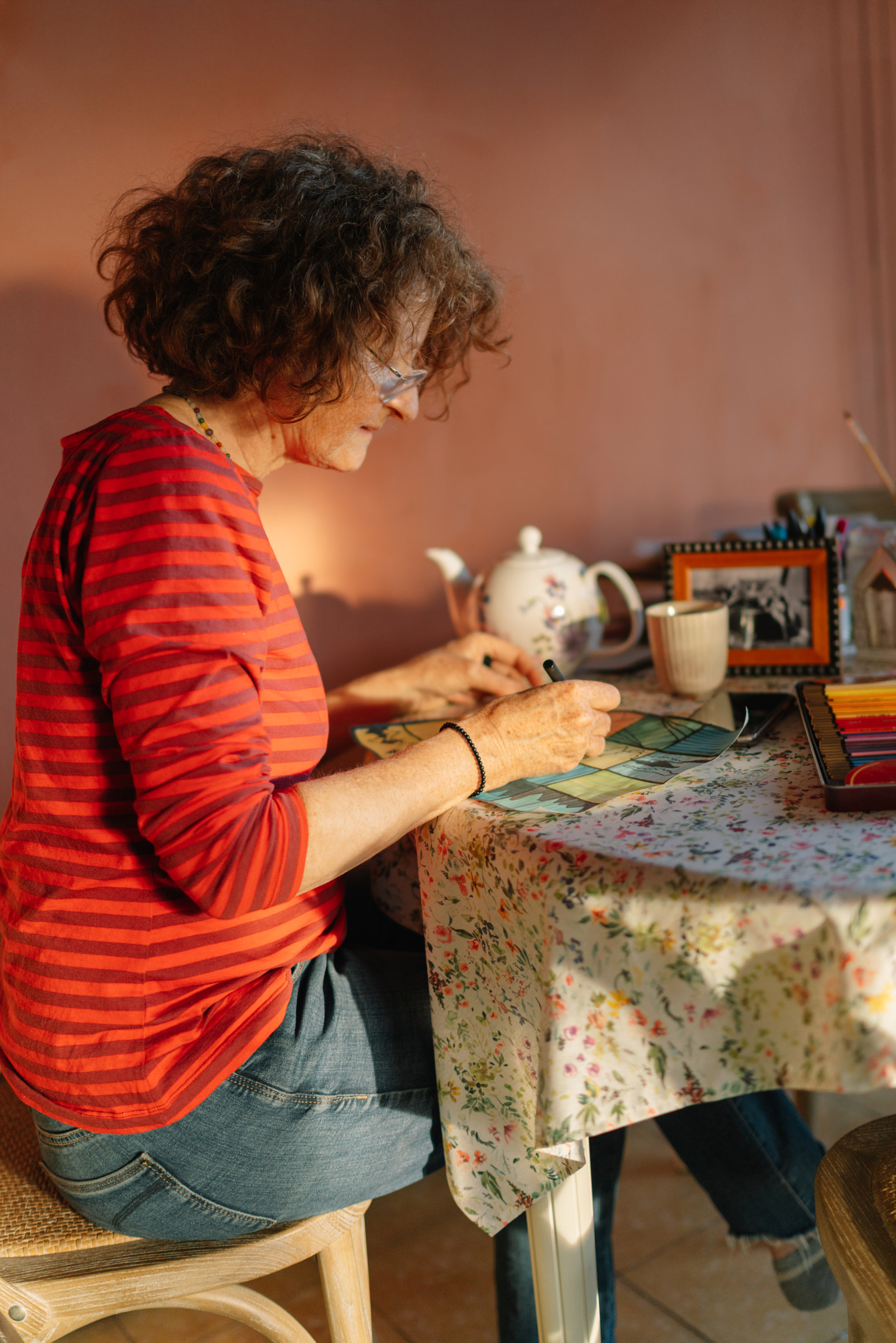 Woman painting on canvas