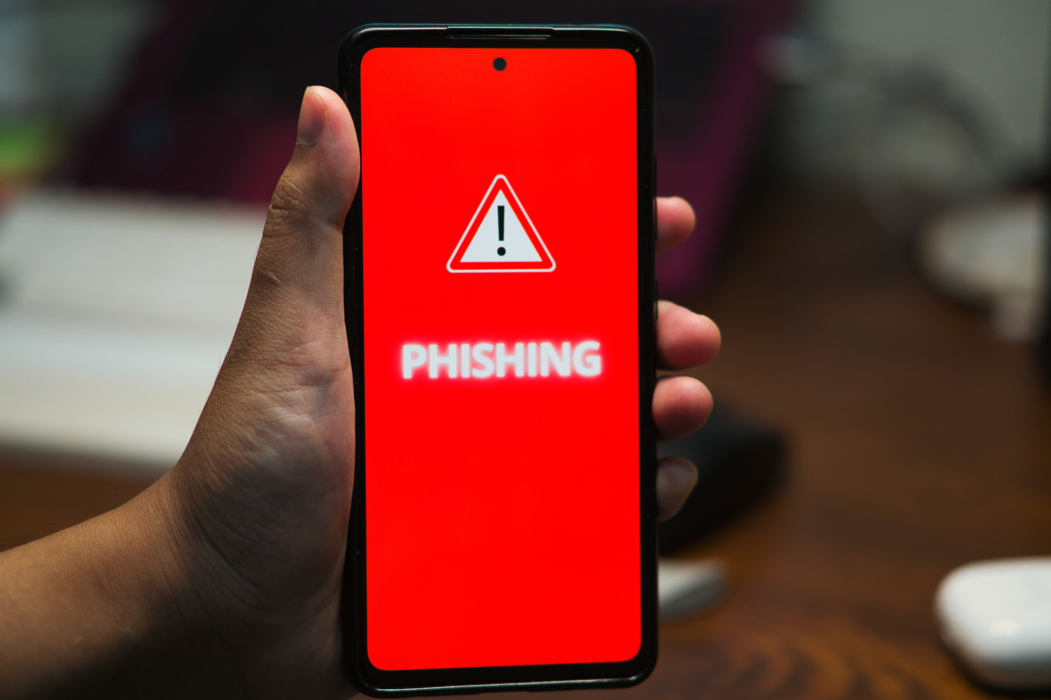 Mobile Phone Displaying Phishing Alert Message as a Security Warning