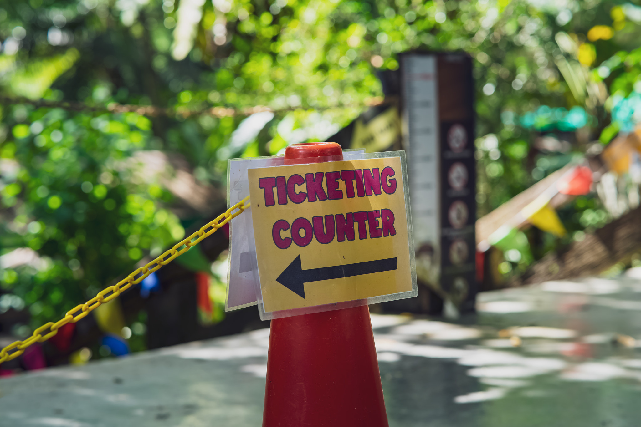 Kuala Lumpur, Malaysia - Oct 14, 2021 : Ticketing counter  sign with arrow at the Farm in the city.