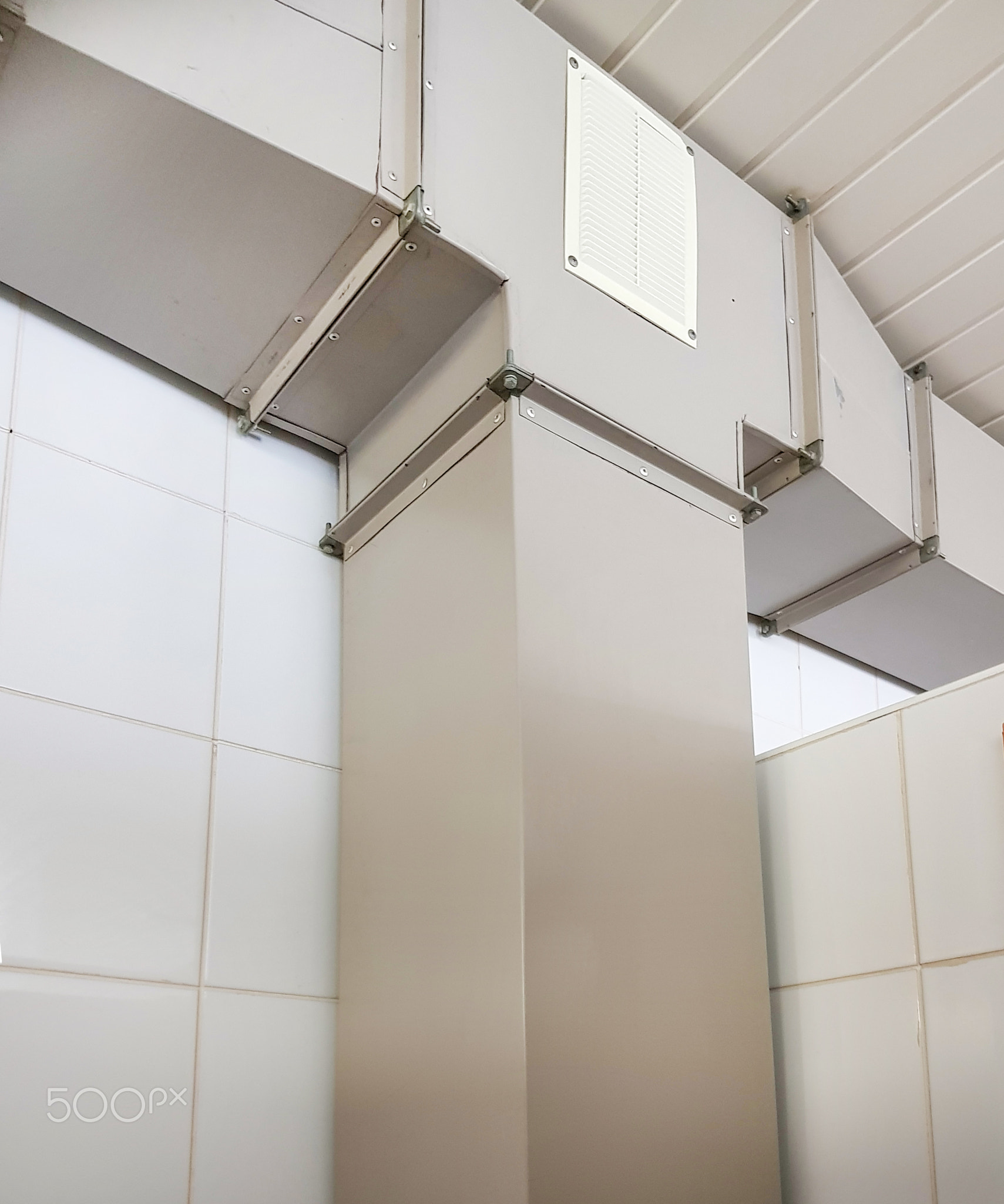 Industrial ventilation, air duct with metal box, indoors, vertical