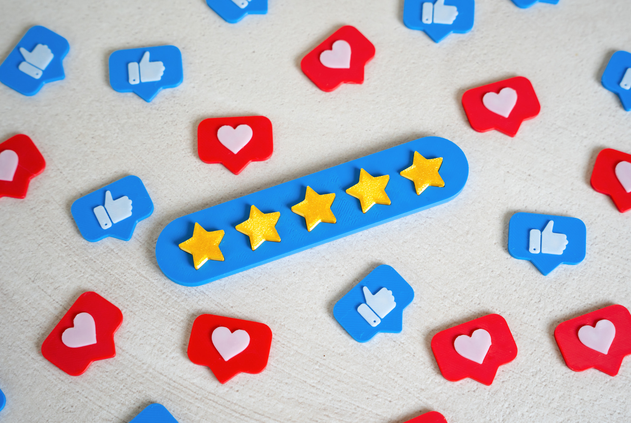 A five-star bar among social media likes. Social validation, high ratings, or quality recognition. C