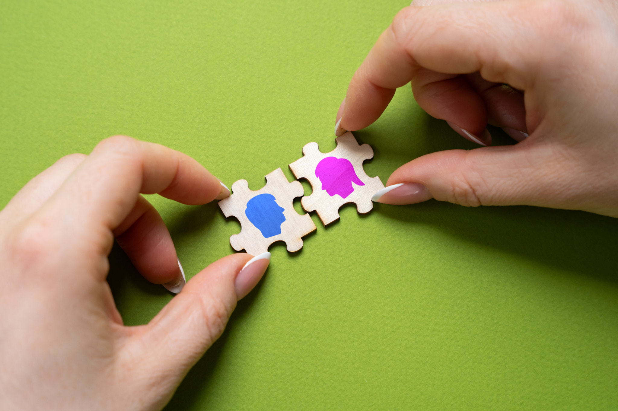 Puzzles with symbols of opposite sexes. Concept of romantic relationships. Search for the second hal