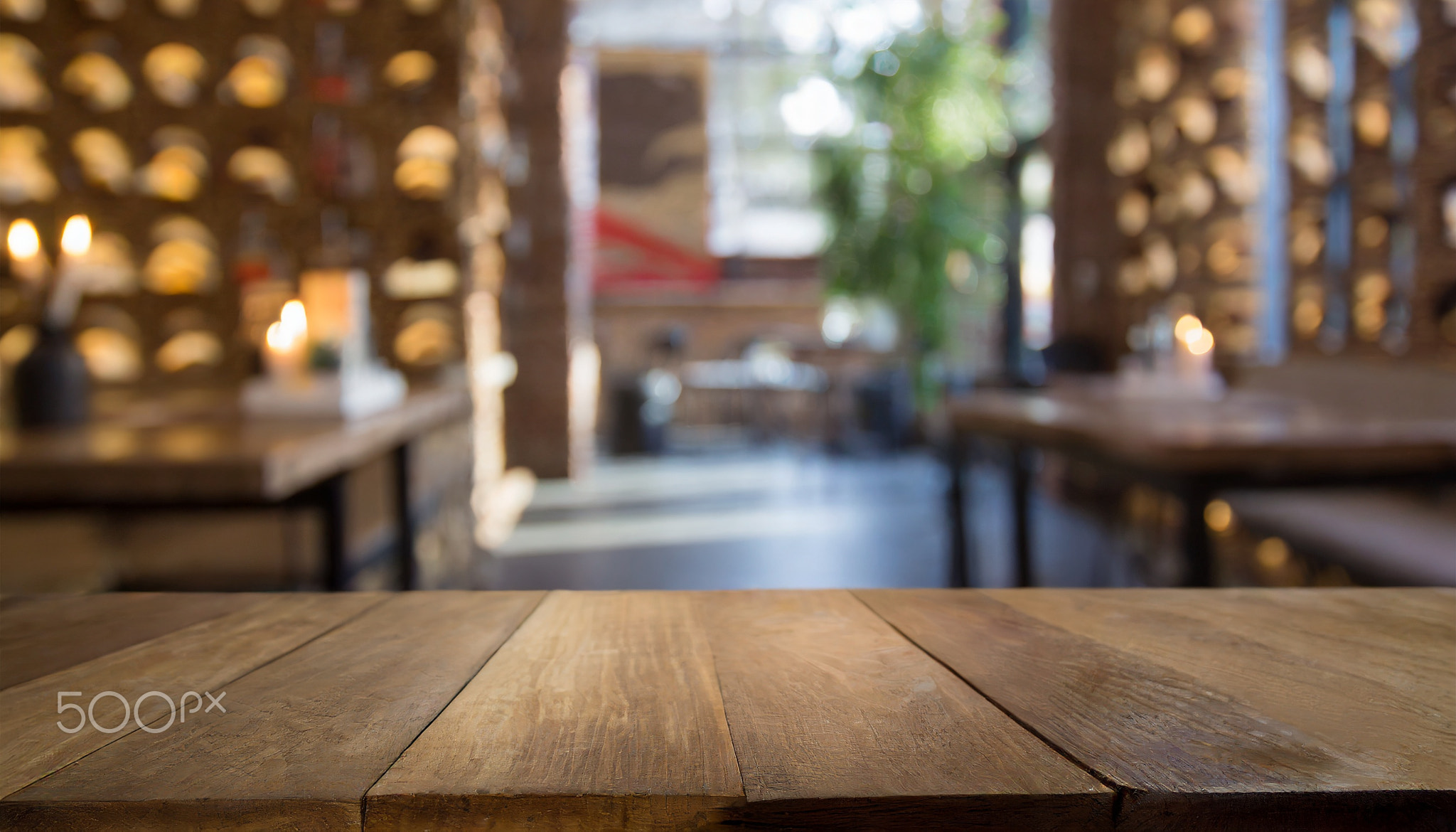 Empty dark wooden table blurred bokeh background