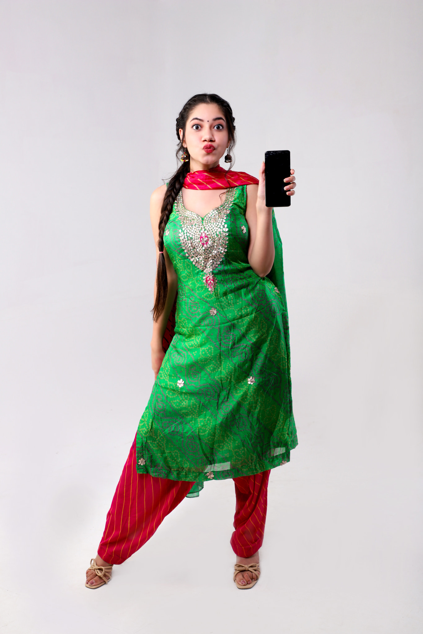 Lady Holding Phone And Displaying Phone Blank Screen