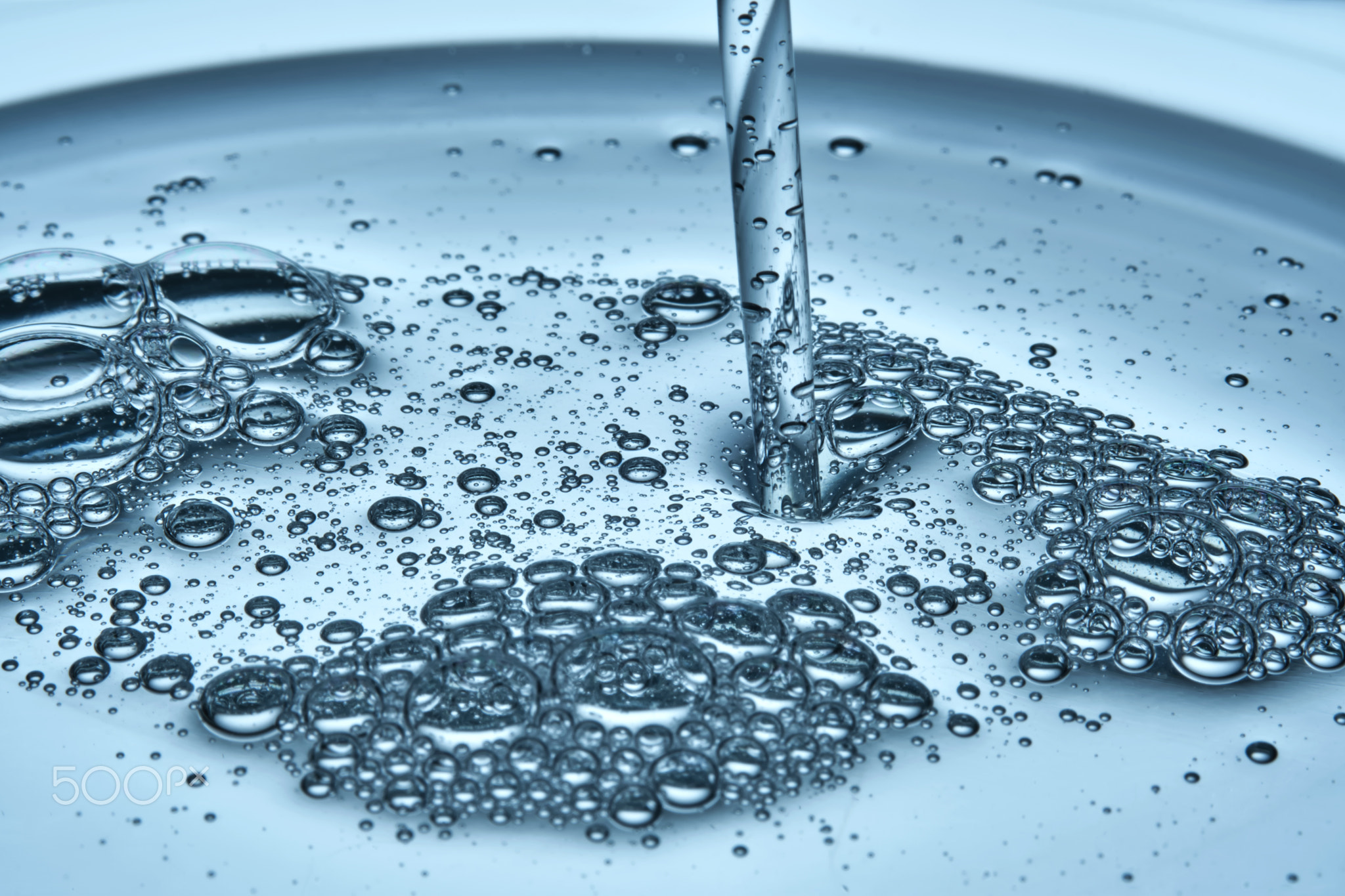 Bubbles in the beautiful texture of hyaluronic serum.