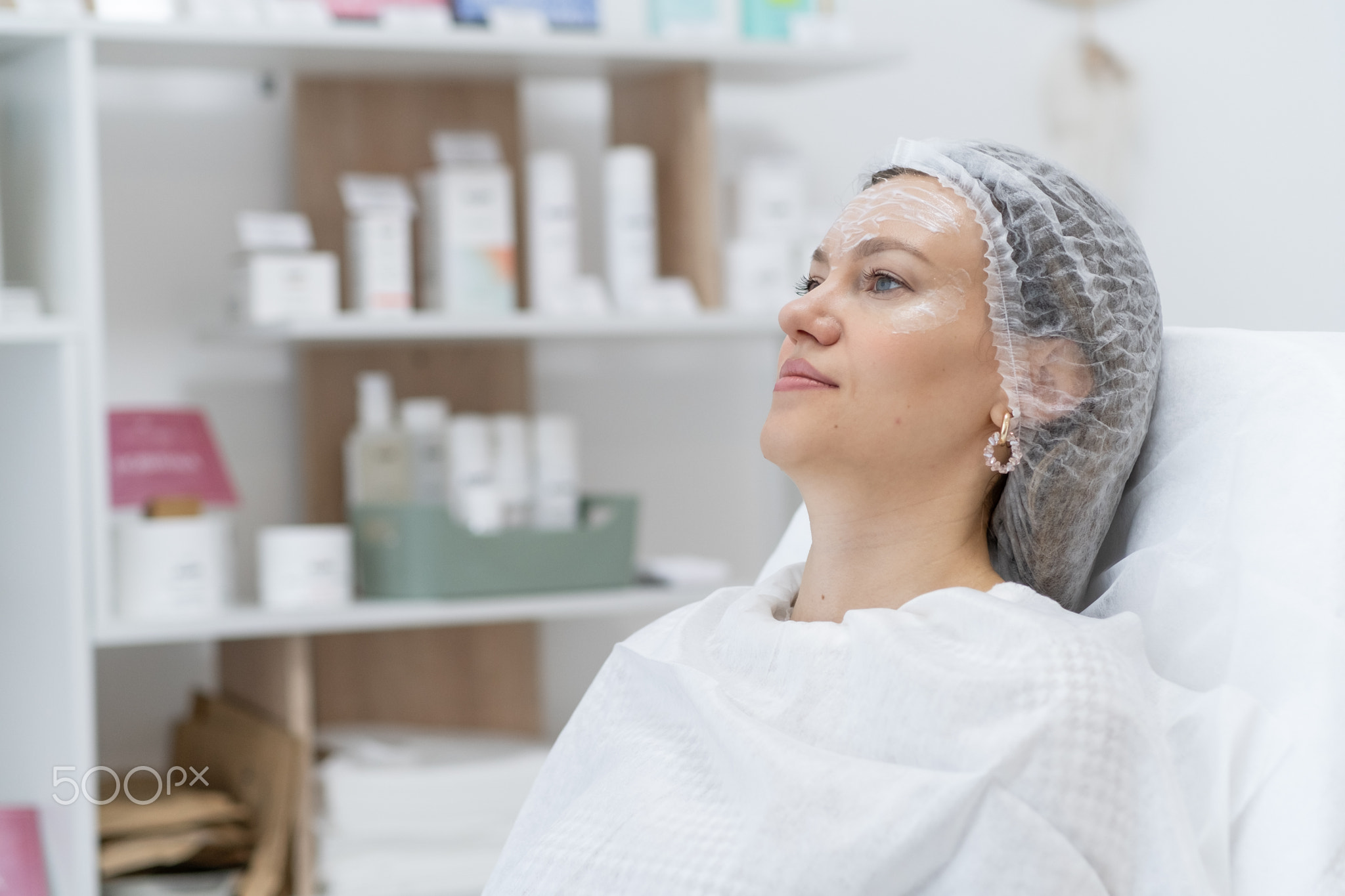 Patient Undergoing Botulinum Therapy in a Modern Medical Clinic Setting, Showcasing Relaxation and