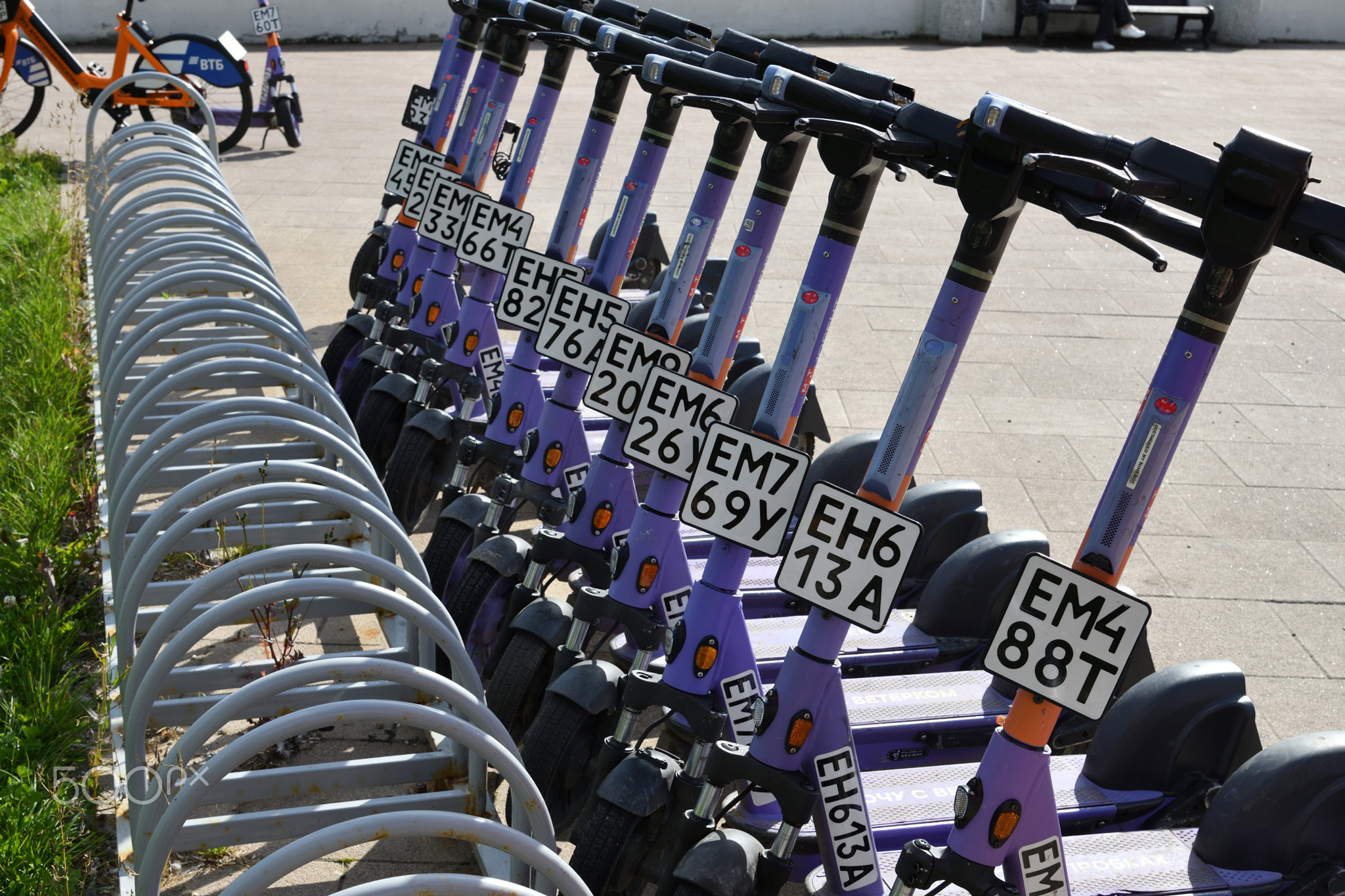 Moscow, Russia - Aug 28 2025 Number plates on Short-term rental service for electric scooters Urent.