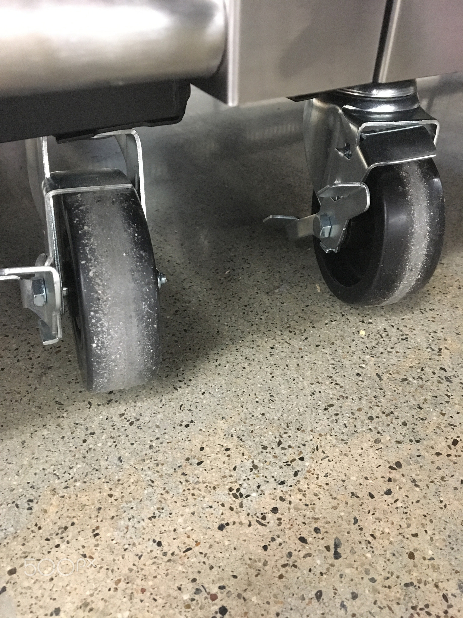 Caster Wheels on Industrial Freezers Sitting on a Concrete Floor