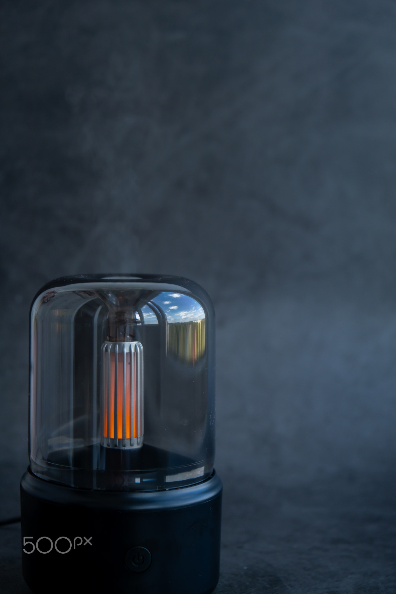 Close up of home perfume scent air humidifier with light. Aromatherapy