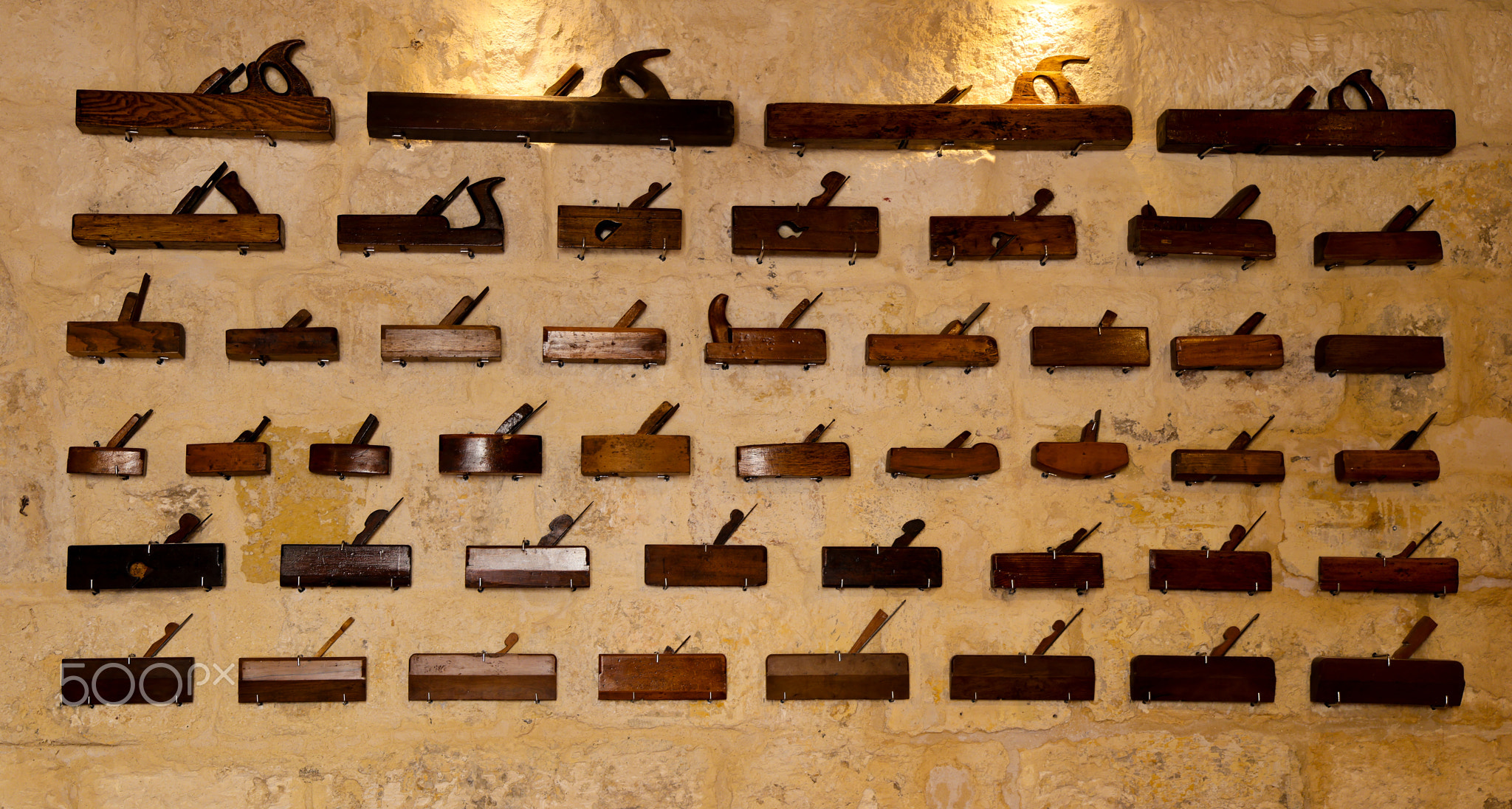 Wall of Craft – Vintage Wood Planes Display