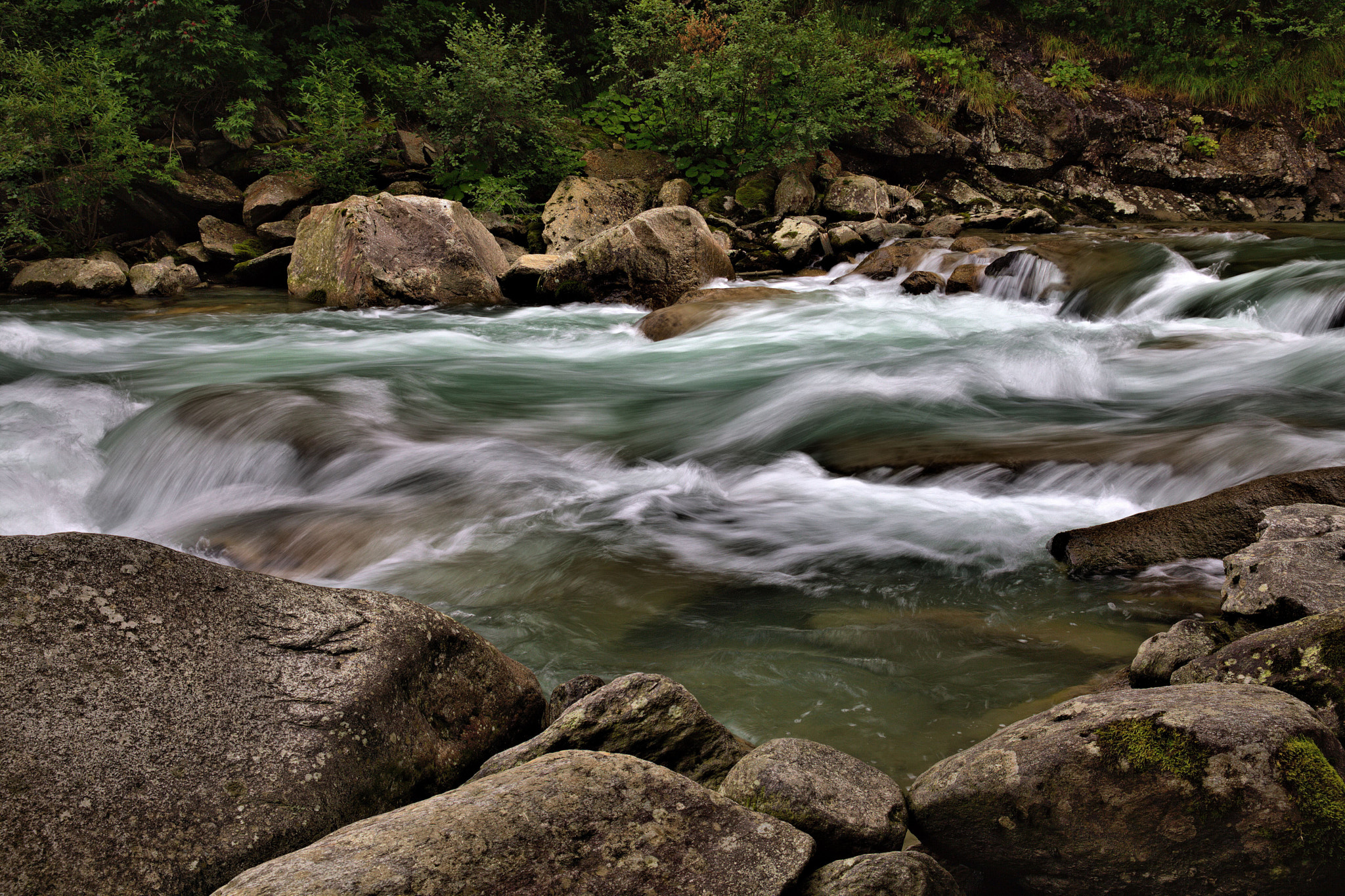 Rushing River Over Rocks Symbolizing Flow and Unstoppable Force ...