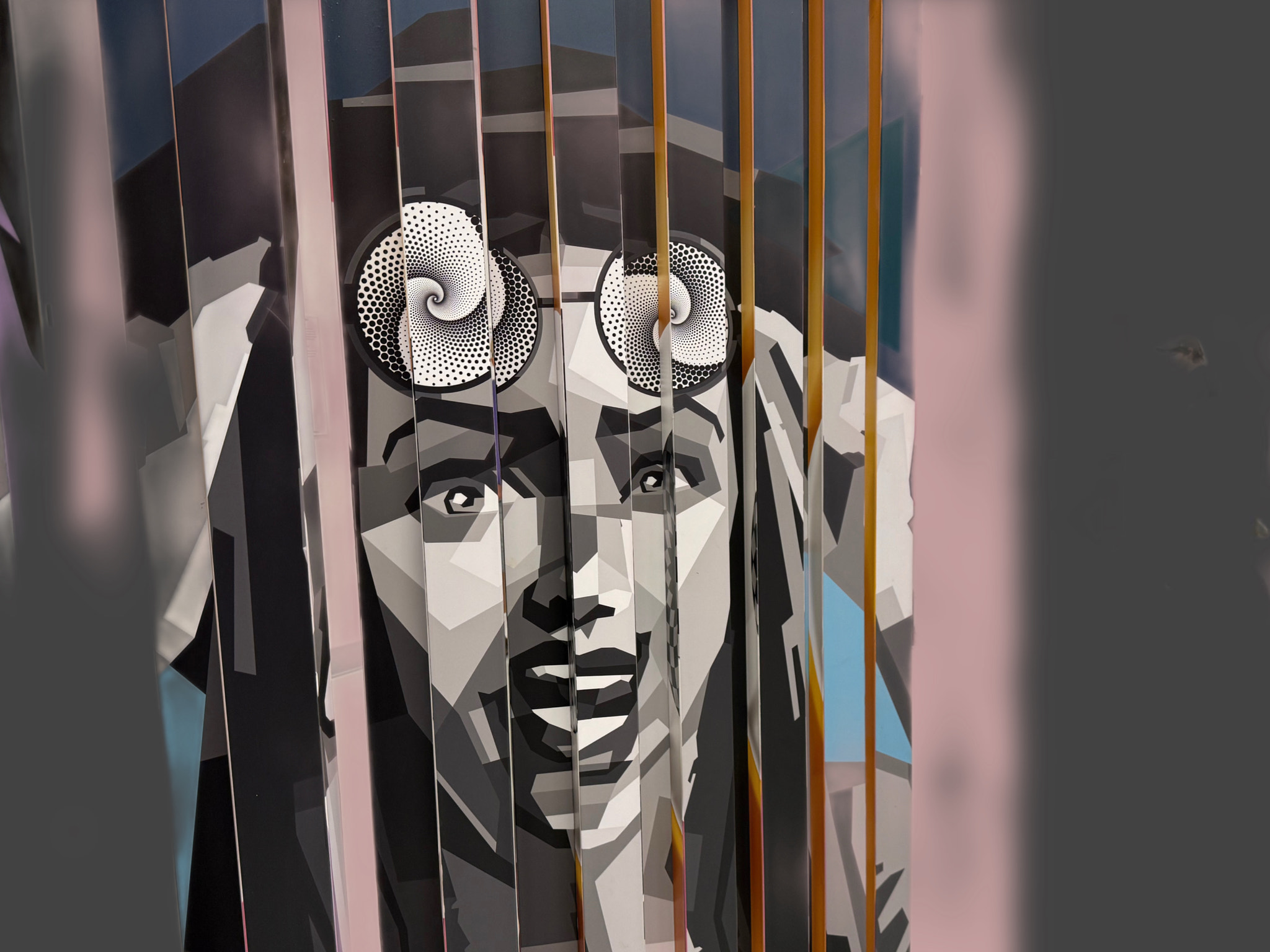 Panels of art lined up to create an image