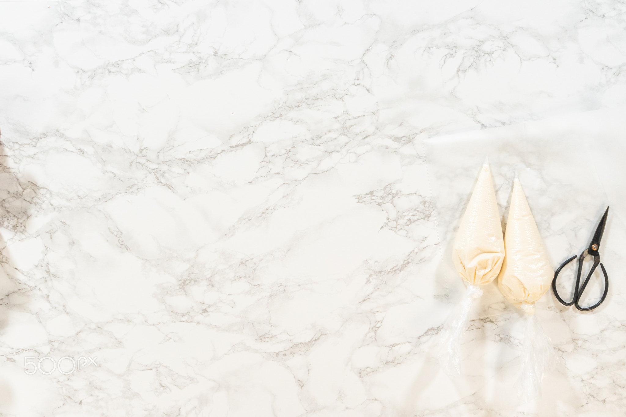 Decorating Gingerbread Man Cookies with Royal Icing for Festive