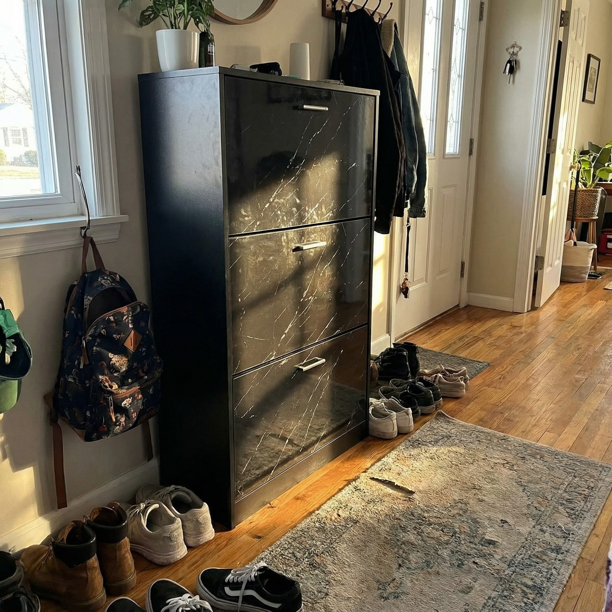 This black shoe cabinet is the perfect match for me