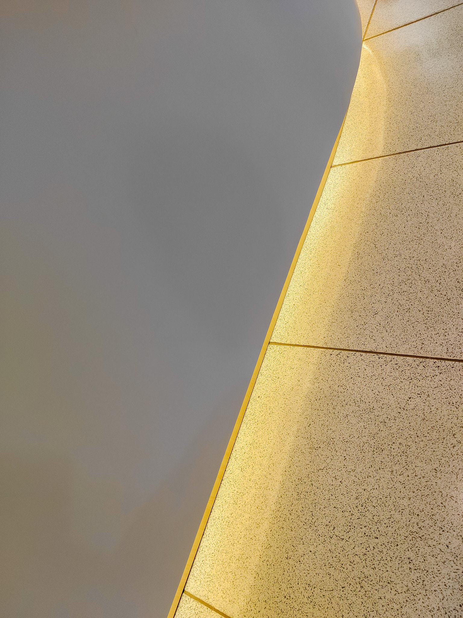 Low angle view of yellow wall