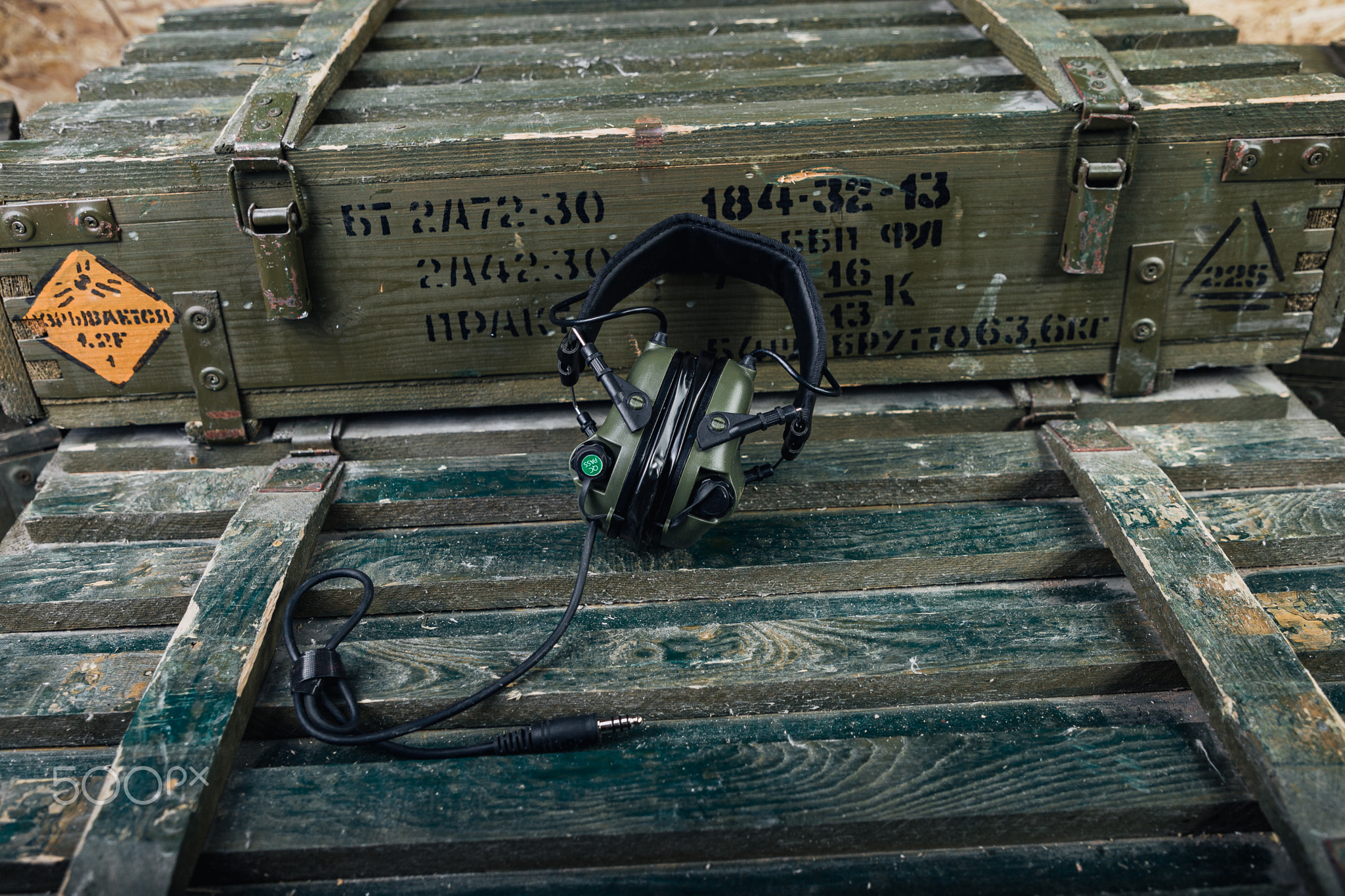 industrial setting featuring aged equipment and textured wooden surfaces for tactical readiness