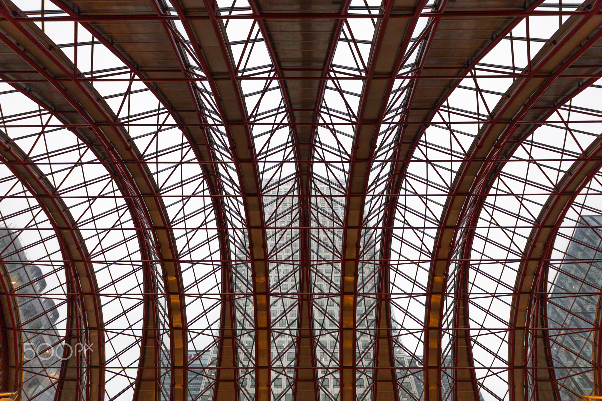 Modern Architectural Roof Structure with Arched Beams. London, UK, 24 December 2023